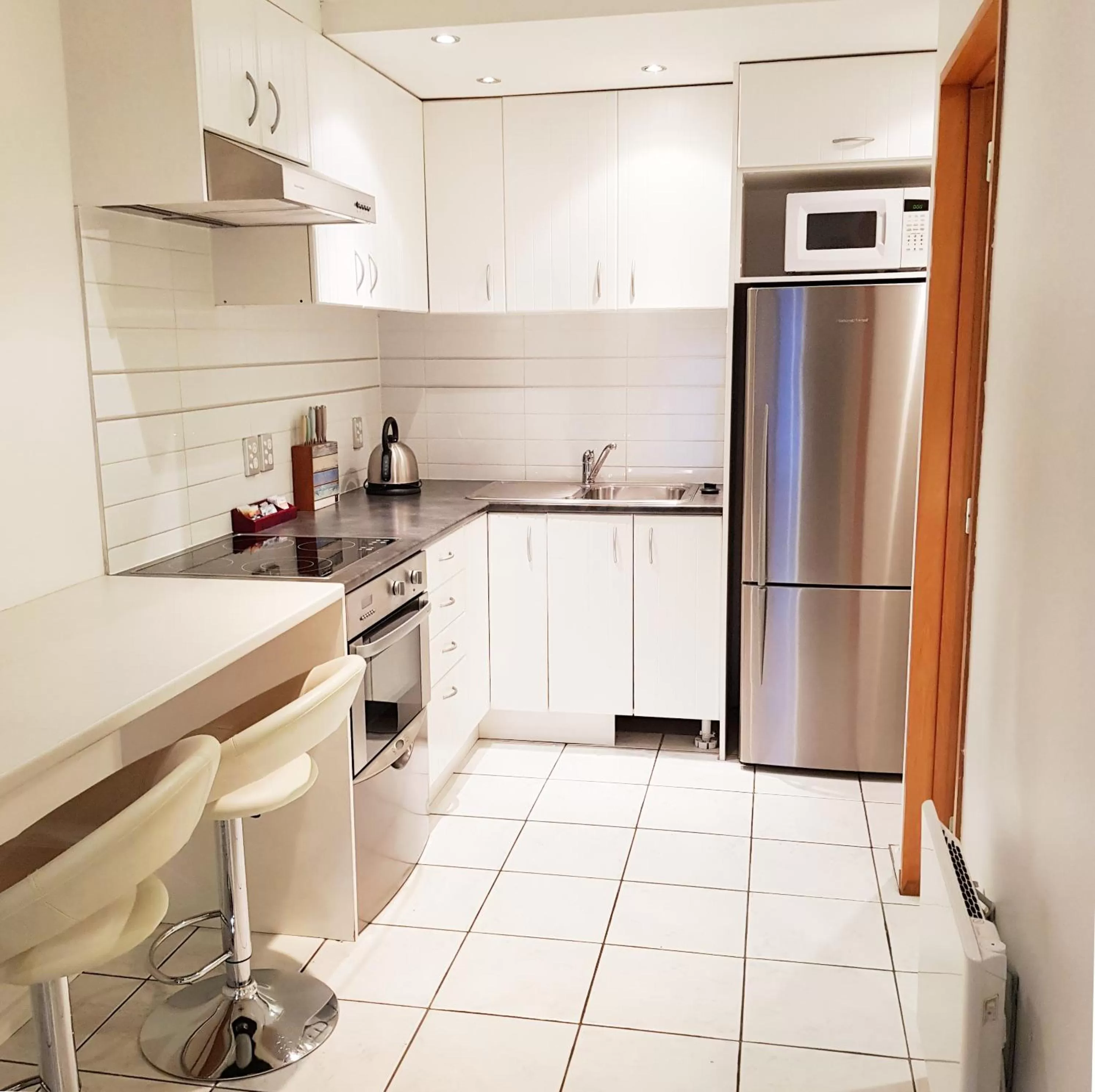 Kitchen or kitchenette in St James Apartments