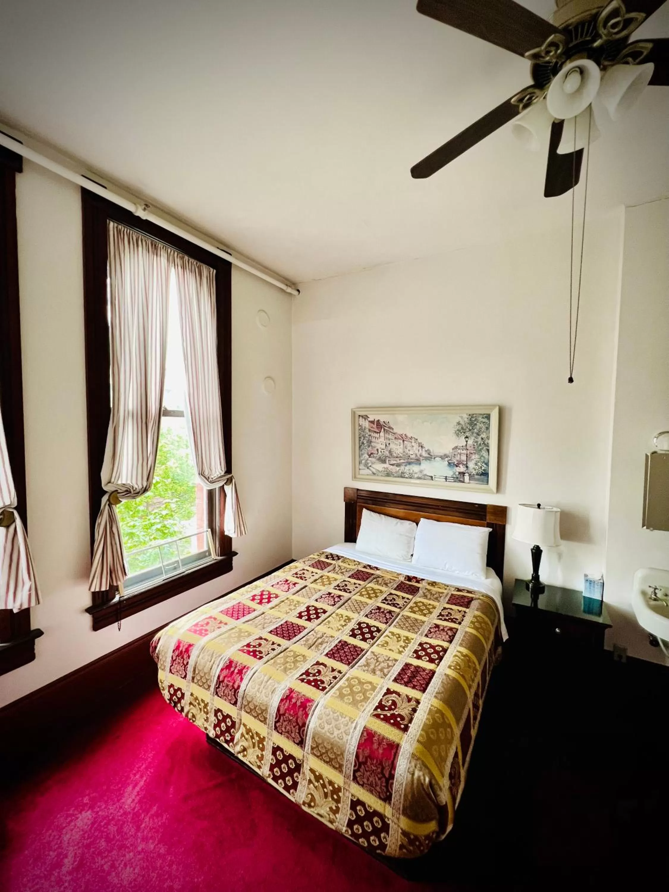 Bed in The Monarch Hotel