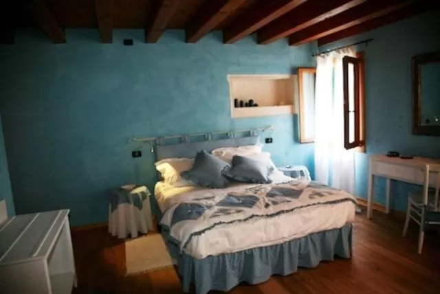 Bed in La Quiete Bed & Breakfast