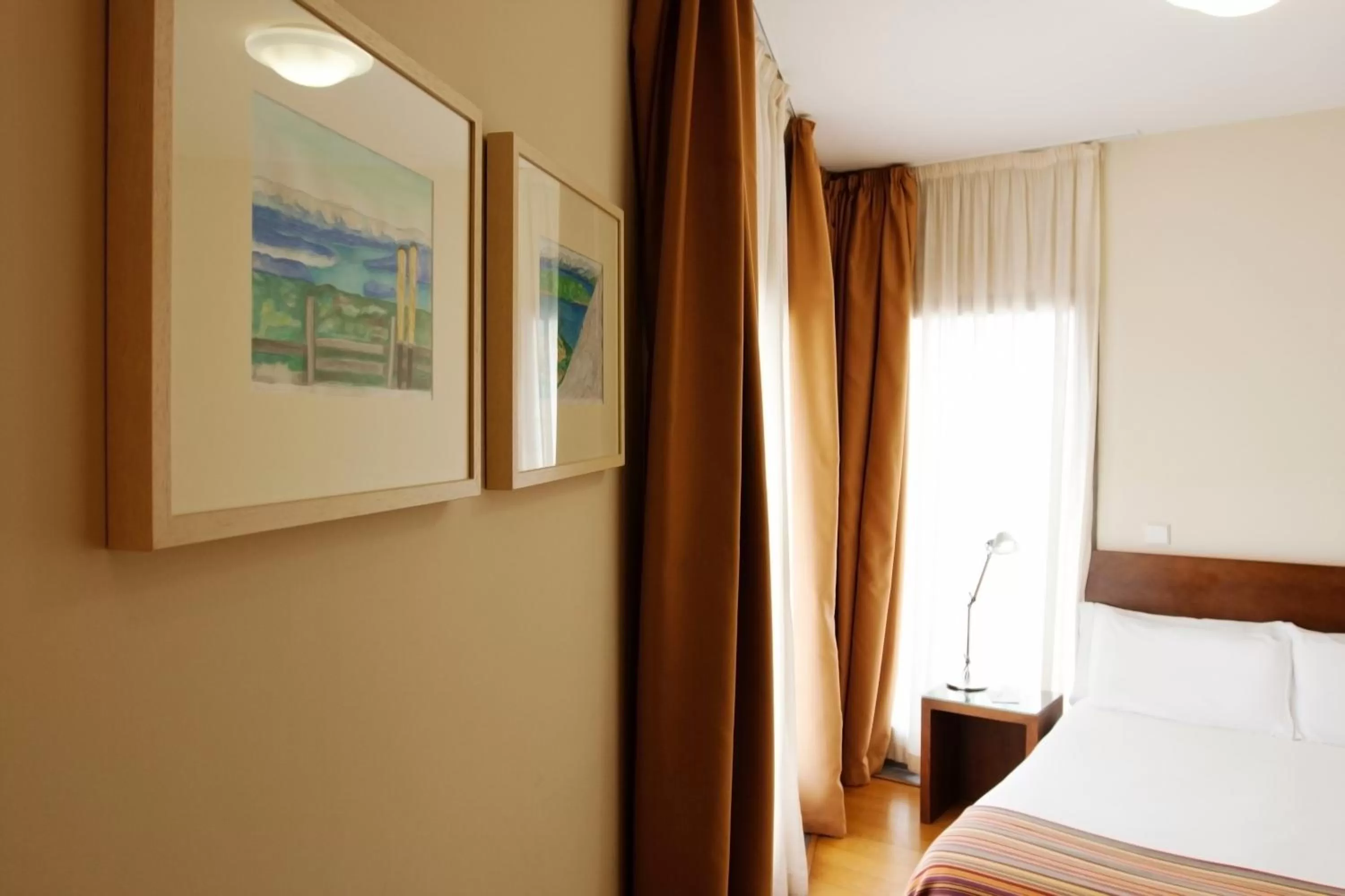 Bed in Hotel Apartamentos Patagonia Sur