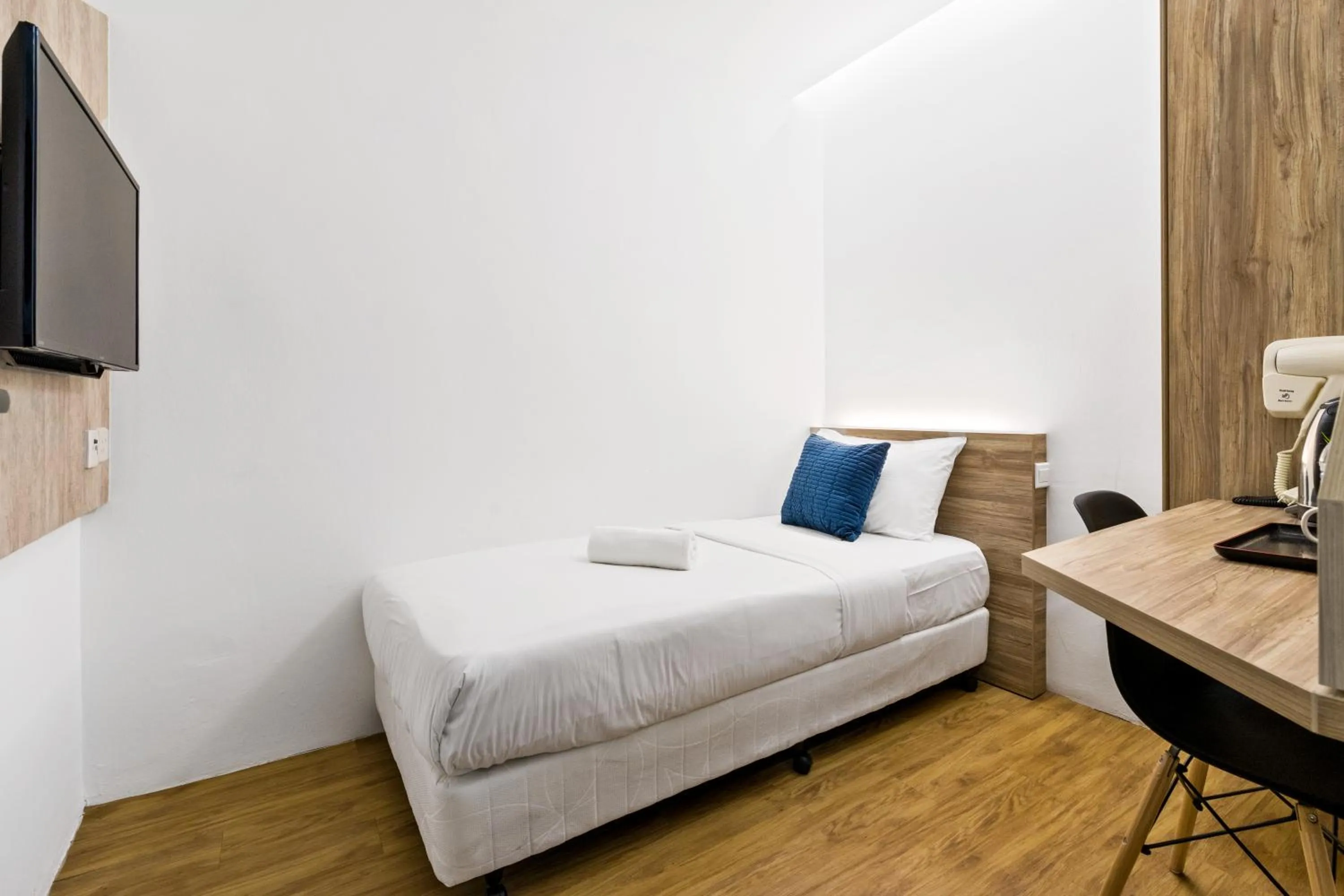 Bed in Rica Hotel Usj