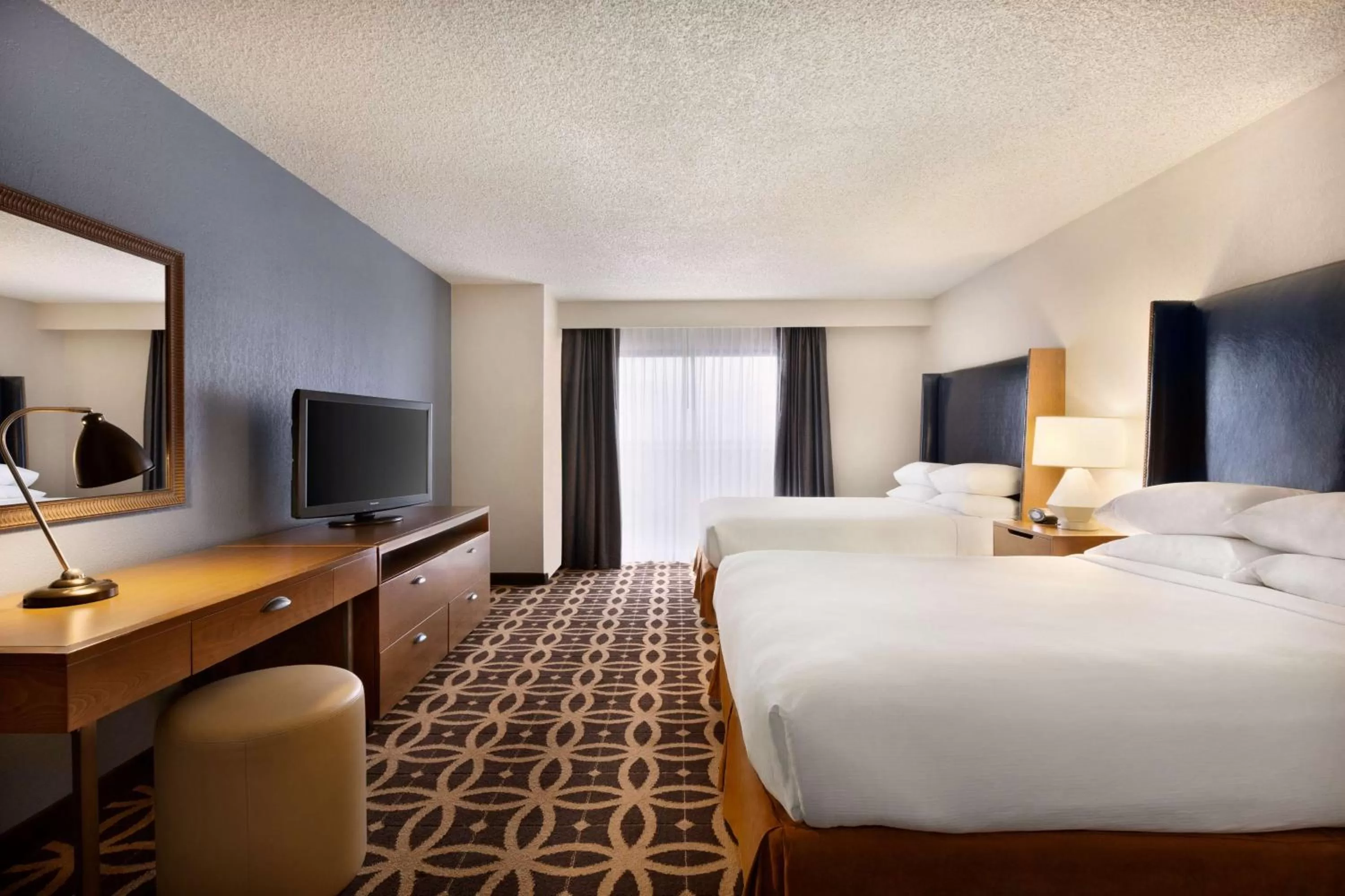 Bed in Embassy Suites by Hilton Dallas DFW Airport South