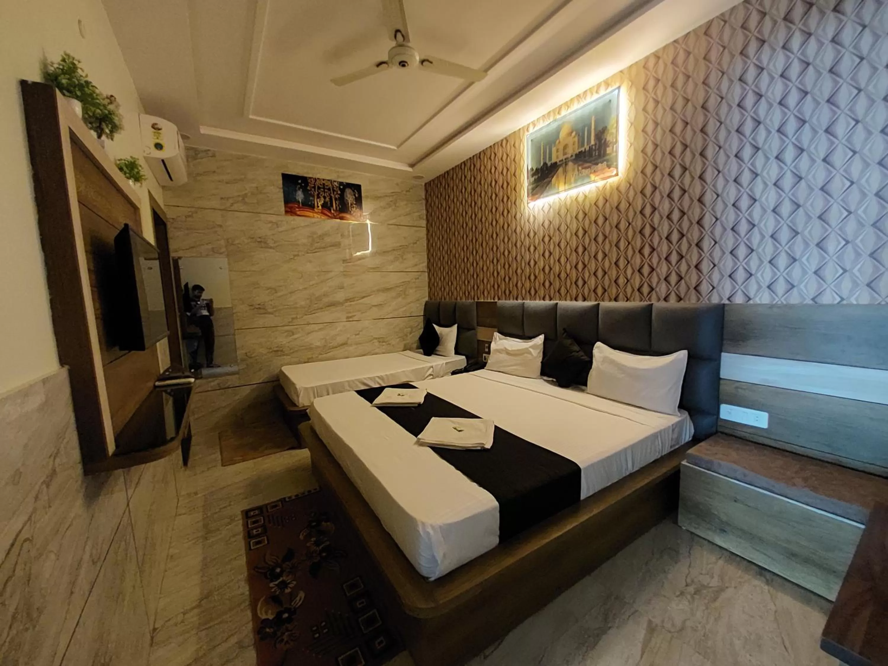 Bed in Taj Nice Point Manage by Taj Sunrise Group