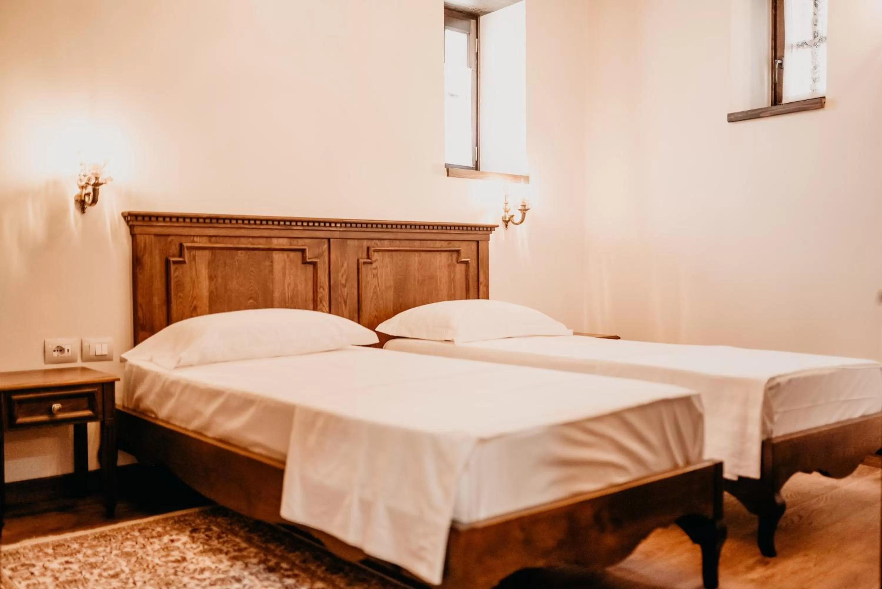 Bed in Beratino Hotel