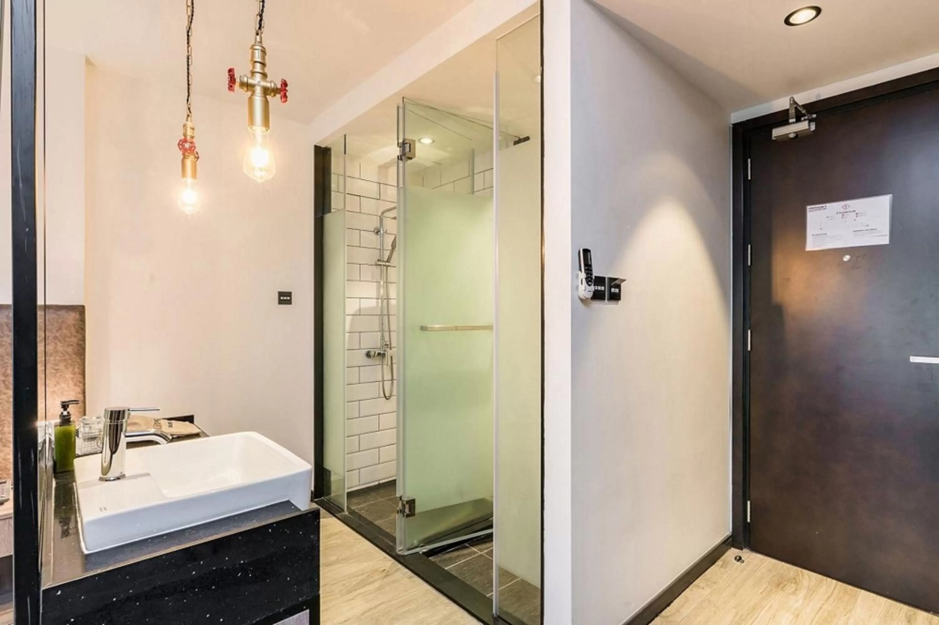 Bathroom in SureStay Plus by Best Western T Pattaya