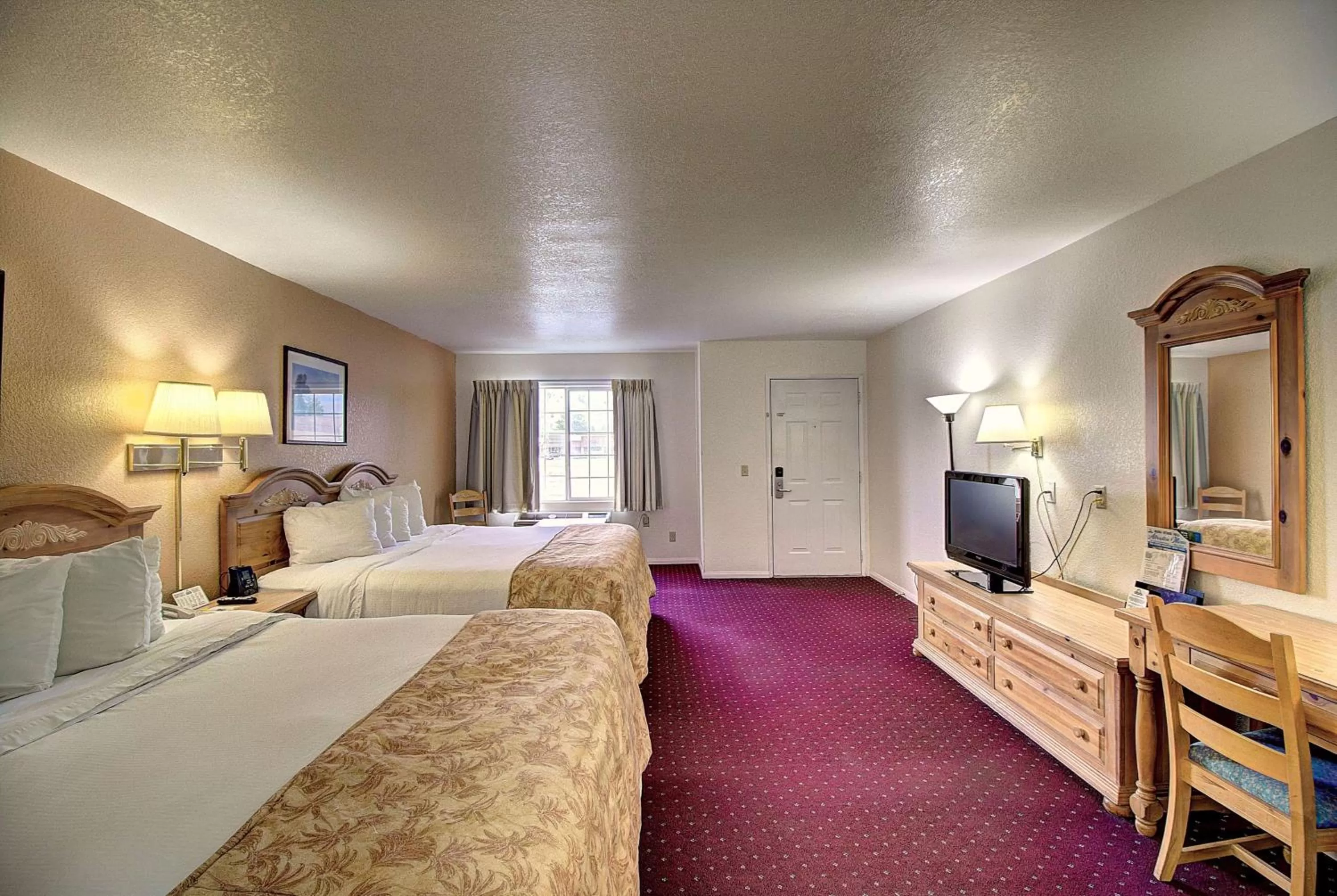 Photo of the whole room, Bed in Days Inn & Suites by Wyndham Lolo