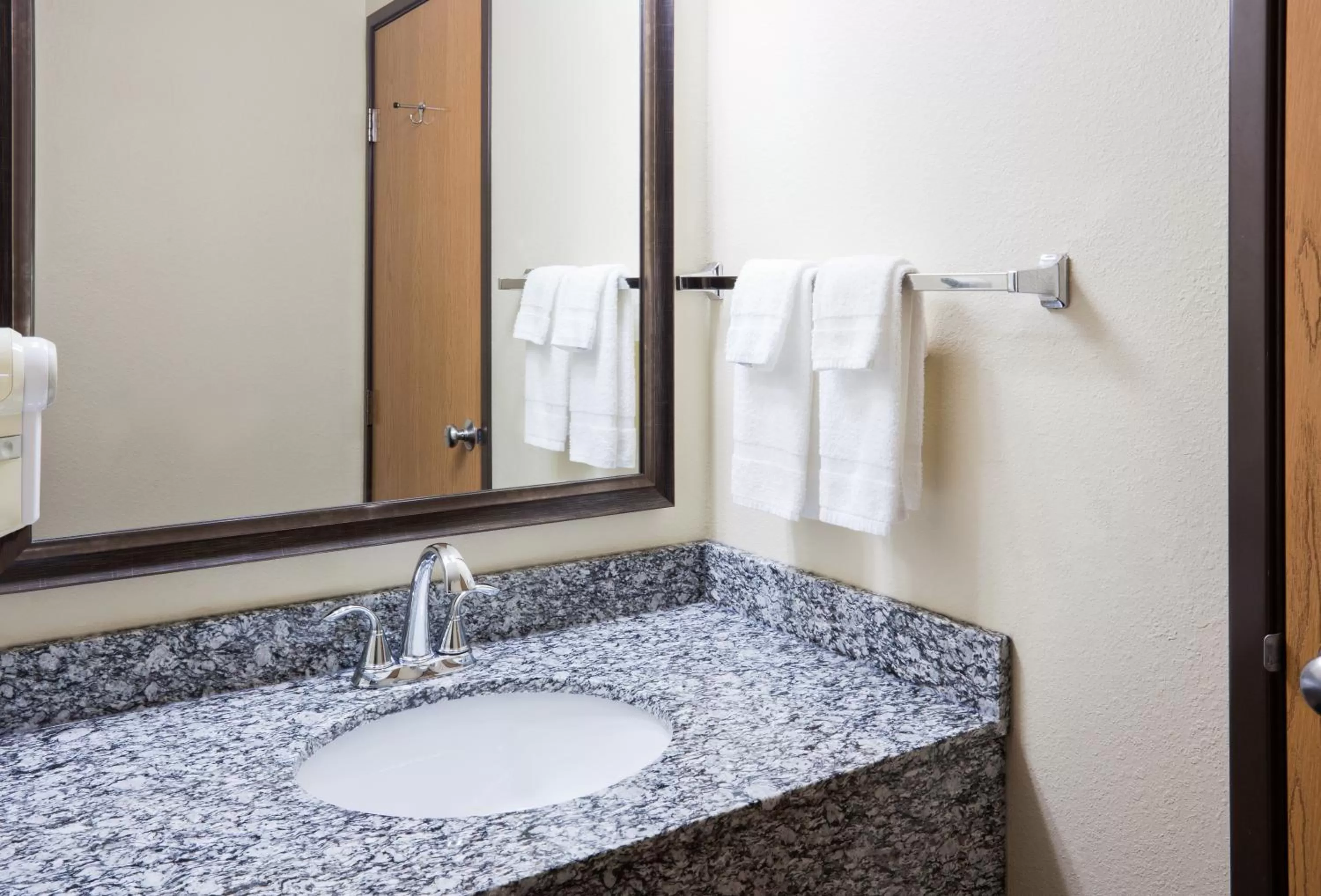 Bathroom in AmericInn by Wyndham Sartell