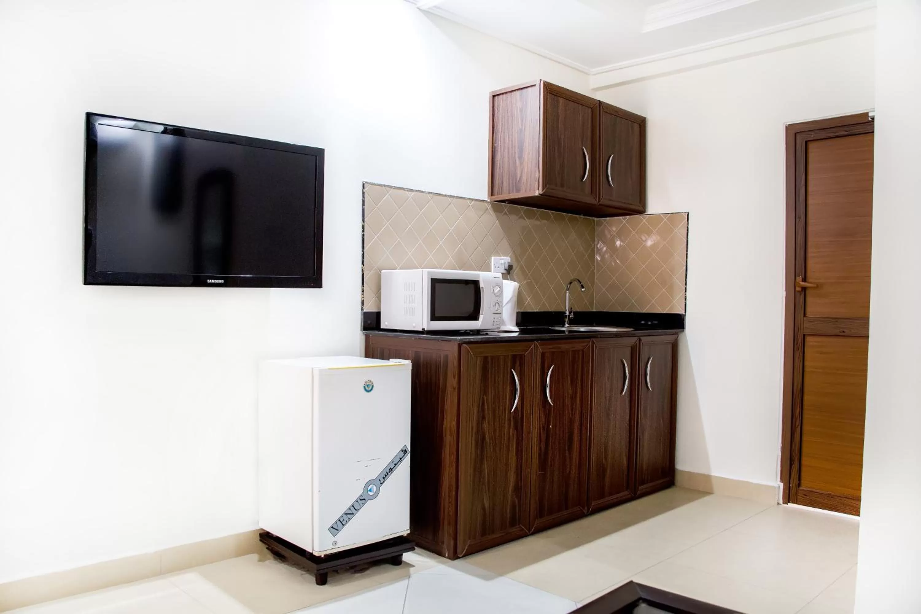 TV and multimedia in Sleep Inn Hotel - Kariakoo