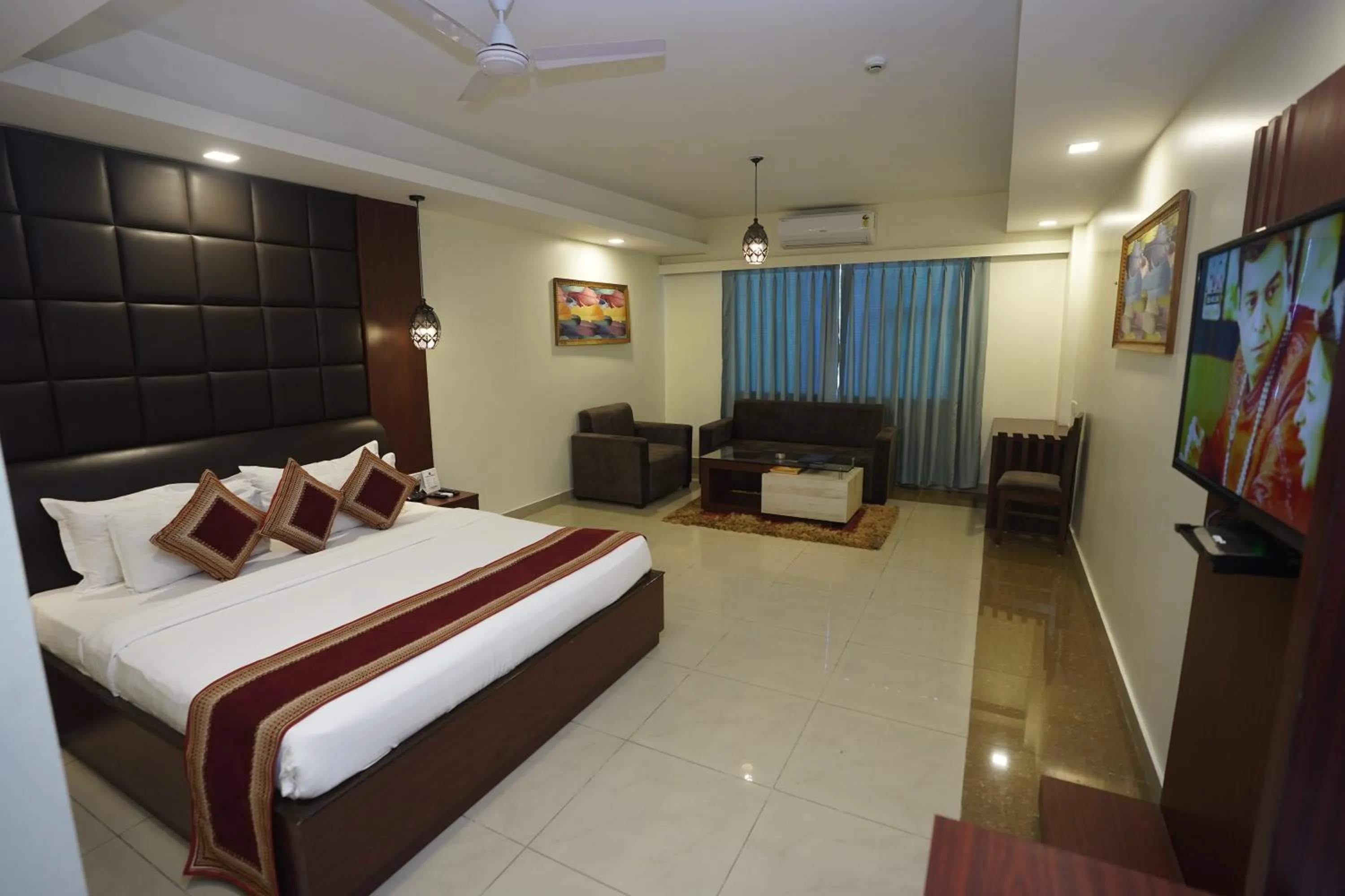 Photo of the whole room, Bed in HOTEL AVN GRAND