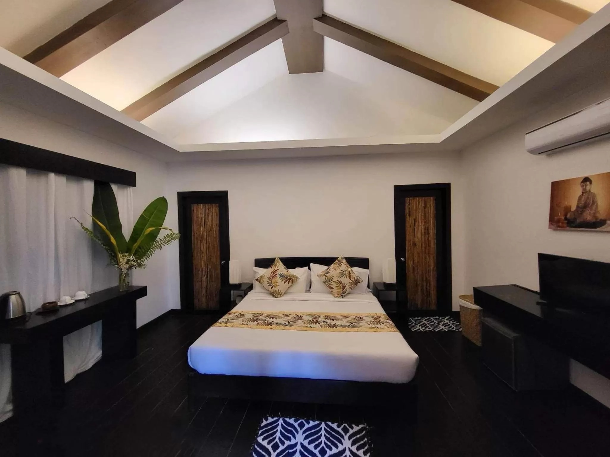 Bed in Lio Villas Resort