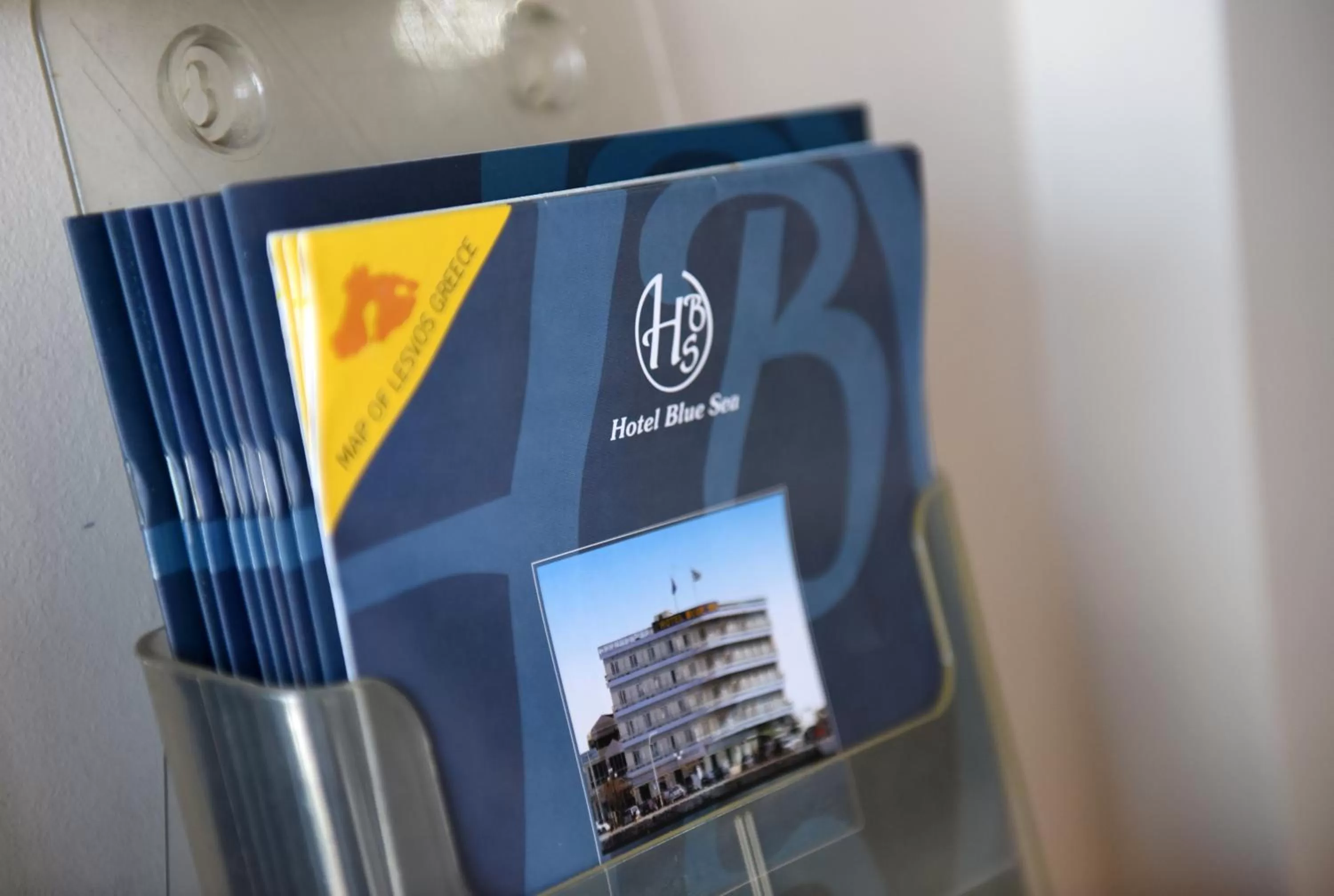 Property logo or sign in Blue Sea Hotel