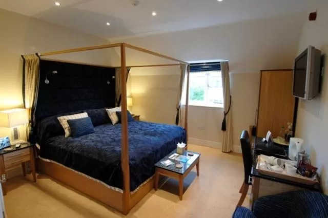 Bed in Redesdale Arms Hotel