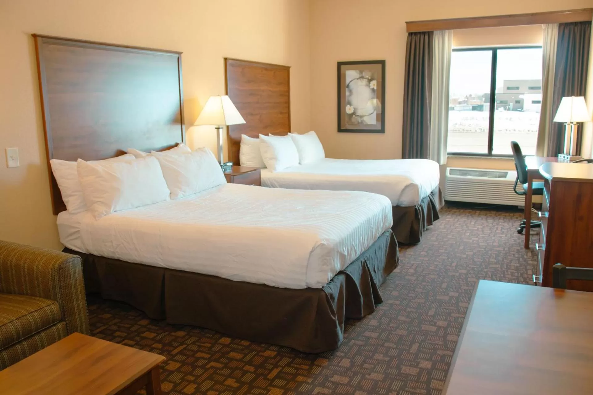 Bed in Expressway Suites of Grand Forks