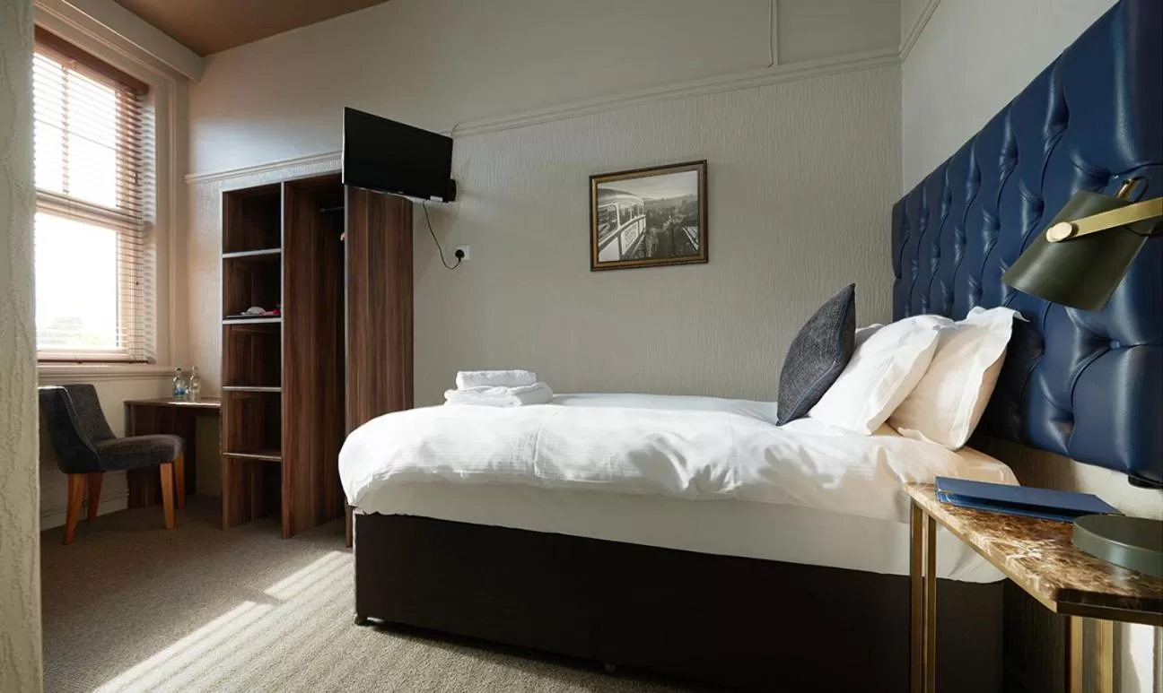 Bed in The Falcon Hotel