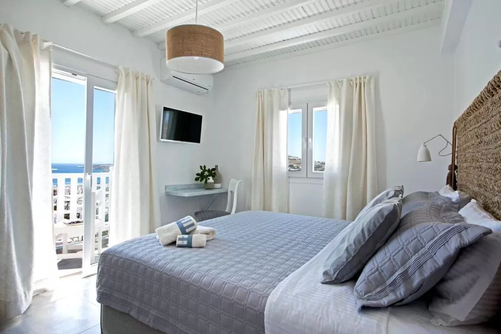 Bedroom, Bed in Amperian Mykonos Suites & Villas