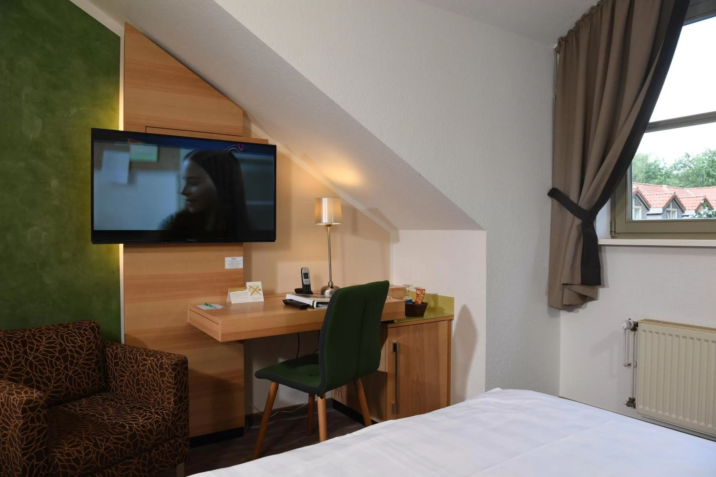 TV and multimedia, Bed in Landhotel Schnuck