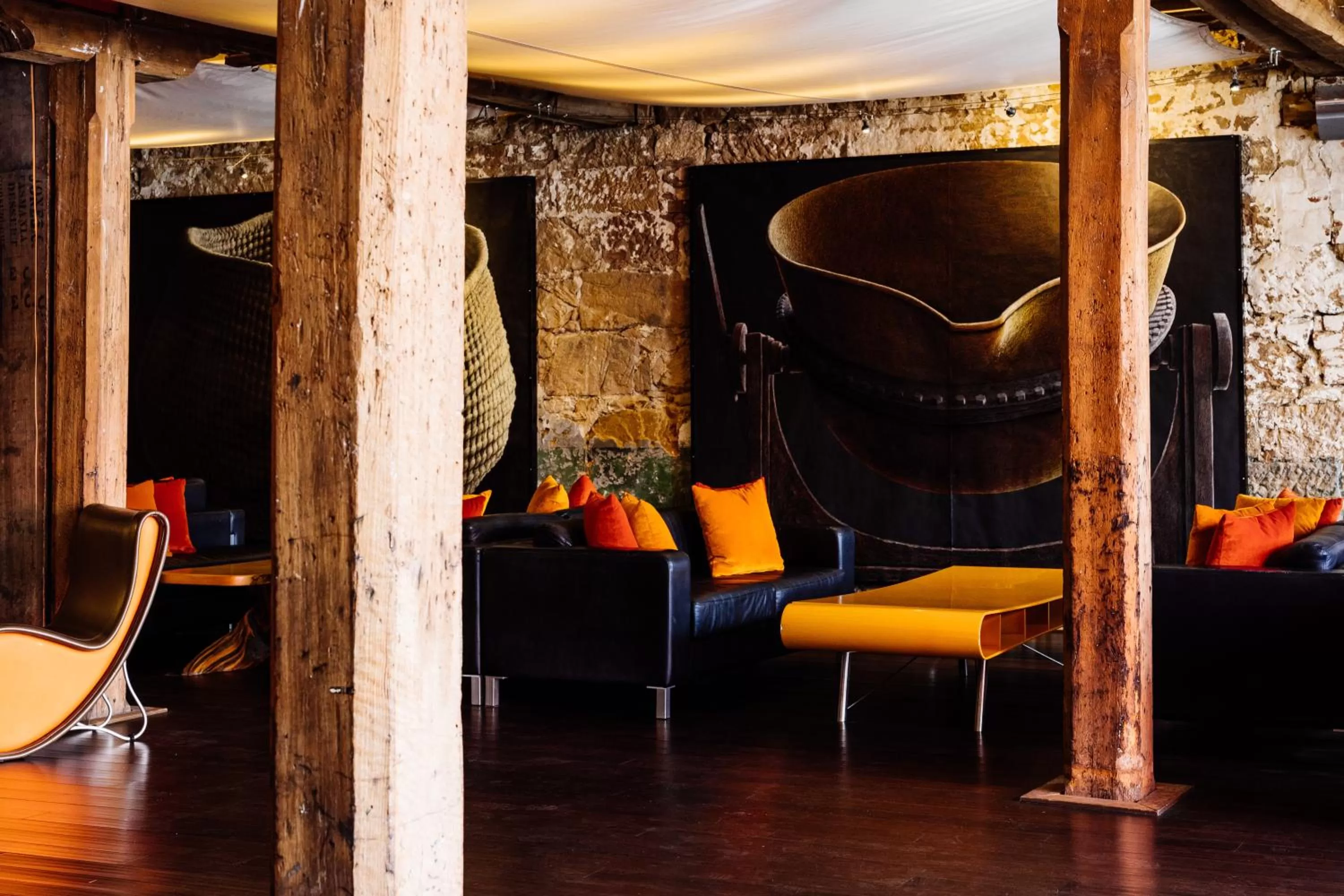 Communal lounge/ TV room in The Henry Jones Art Hotel