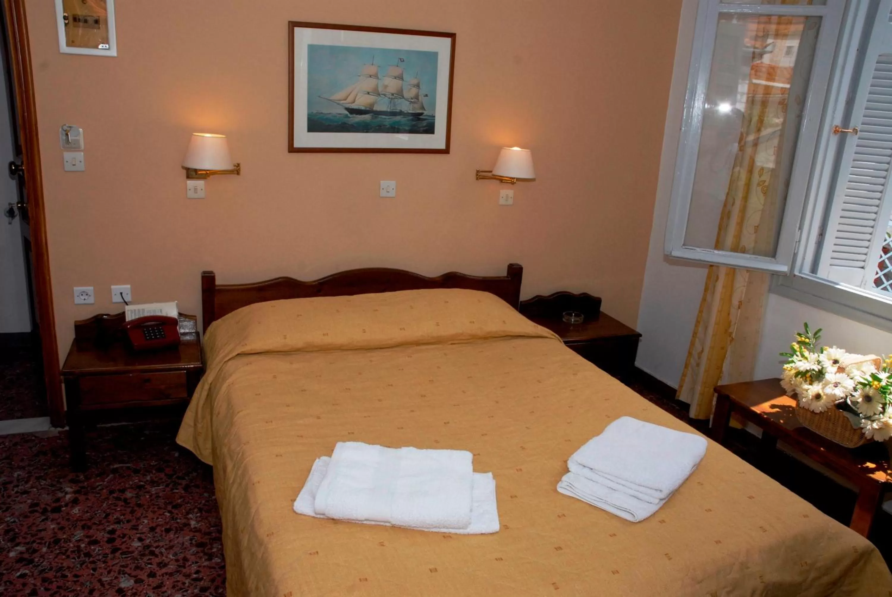 Bed in Amaryllis Hotel