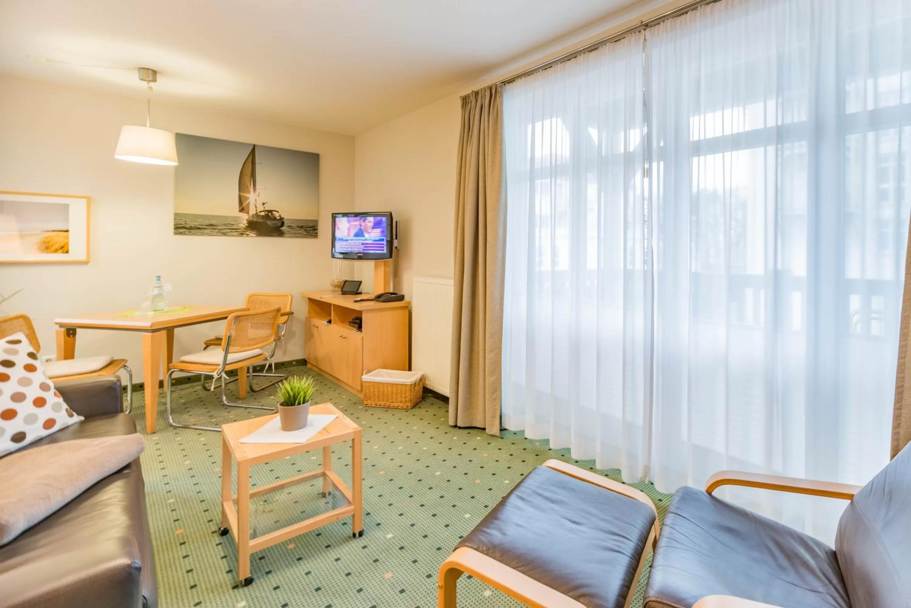 Photo of the whole room, Seating Area in Am Weststrand Apartmenthaus Waldeck