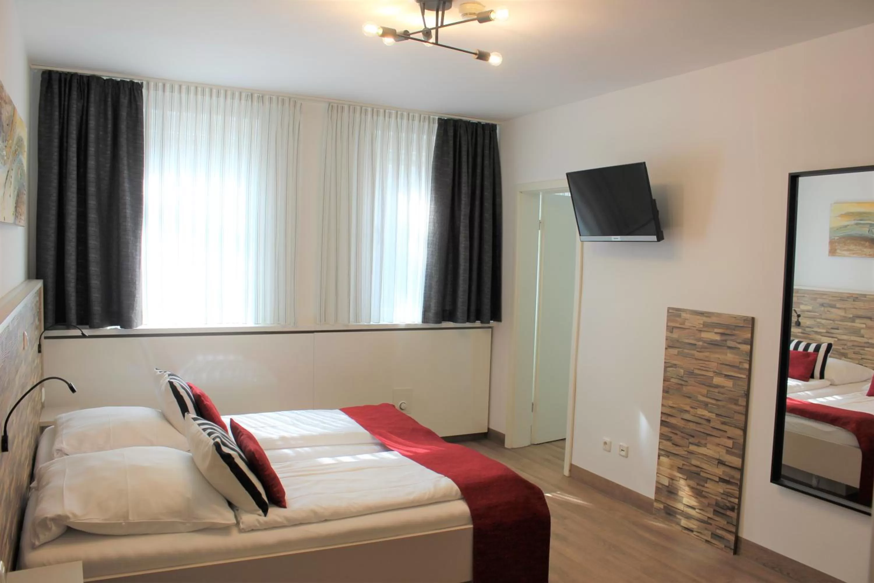 Photo of the whole room, Bed in Am Blumenhaus