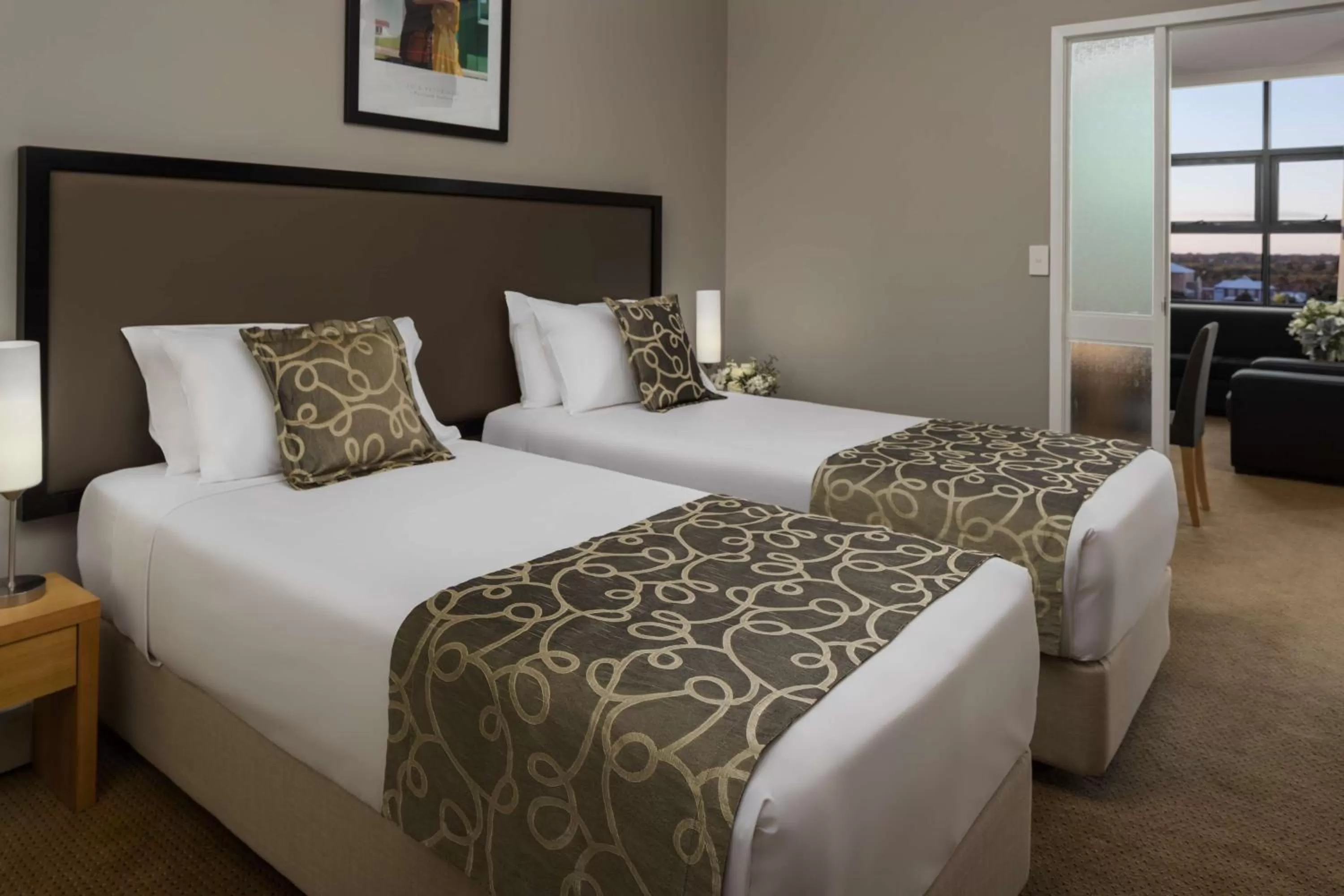 Photo of the whole room, Bed in Rydges Mackay Suites