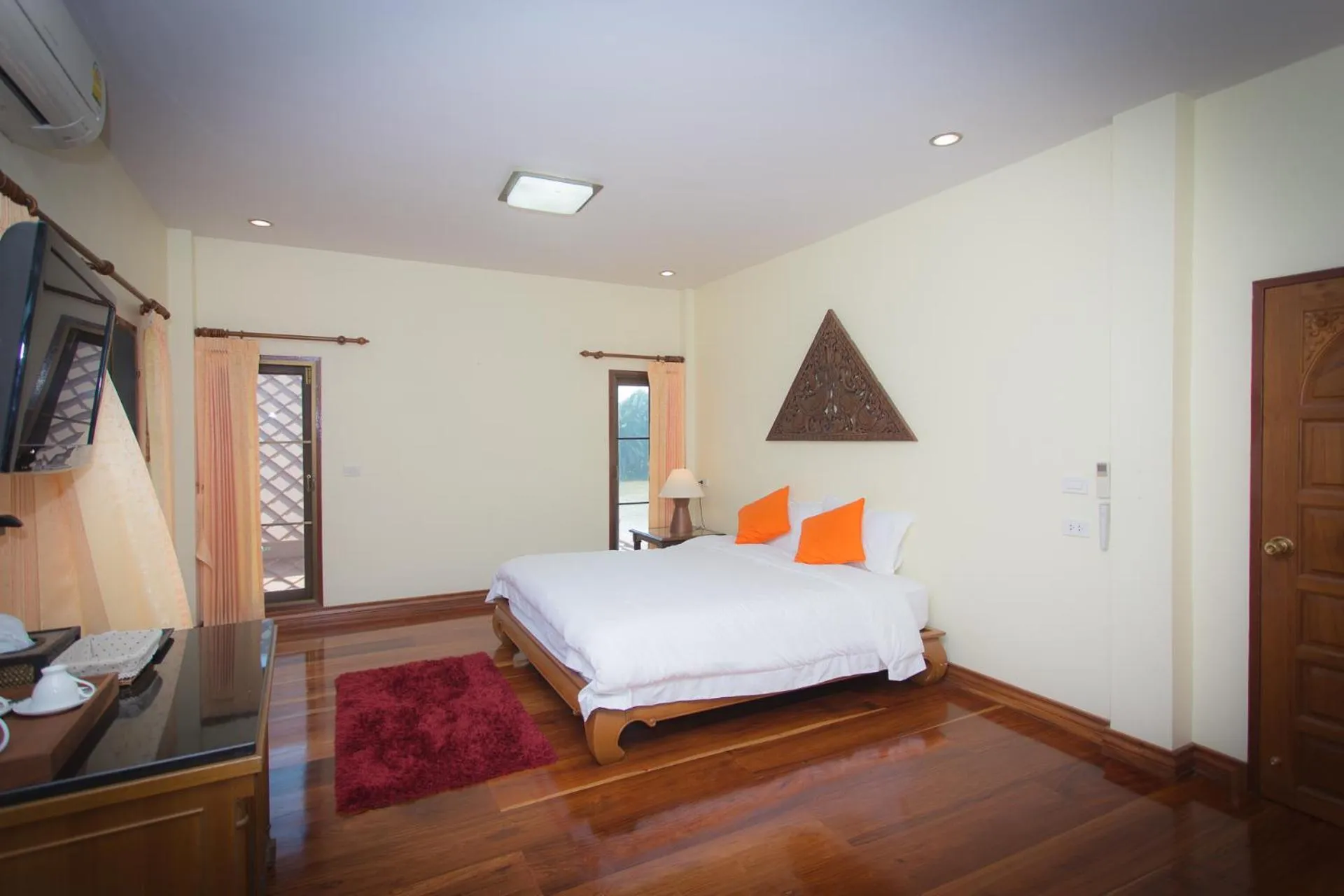 Bed in Thararin Villa