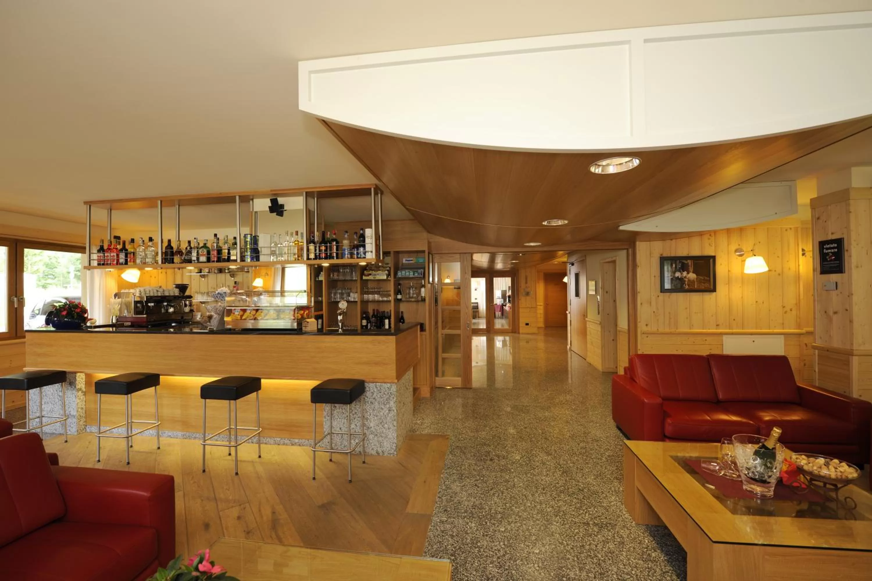 Communal lounge/ TV room in Hotel Garni Pegrà