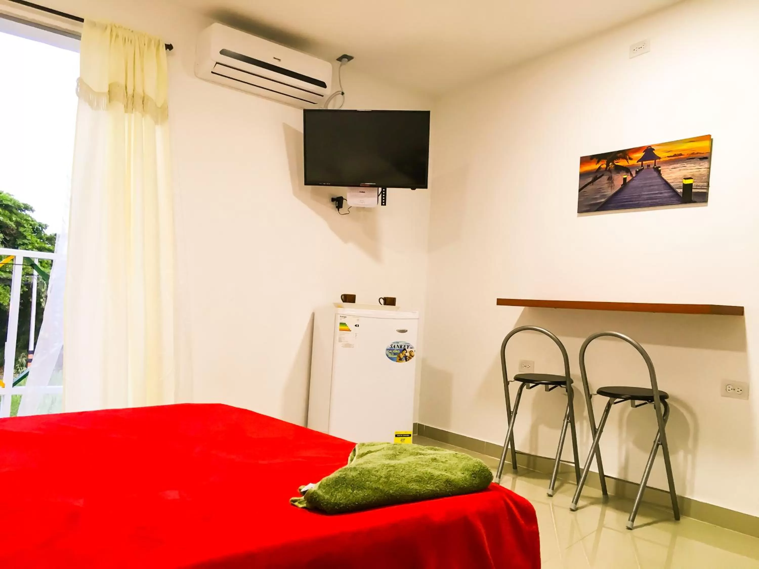 Bed in Posada Miss Joyce House