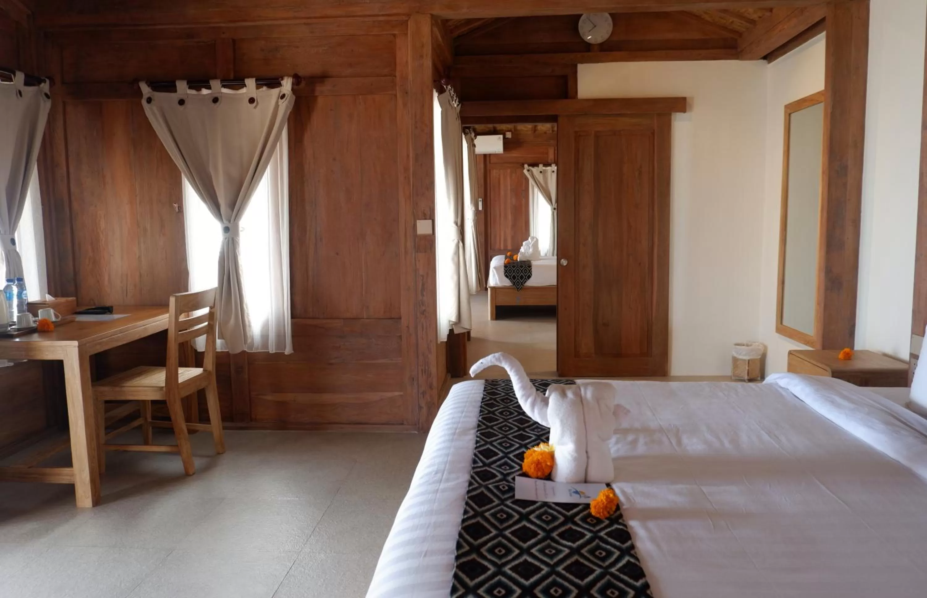 Property building, Bed in Blue Harbor Beachfront Villas & Resto