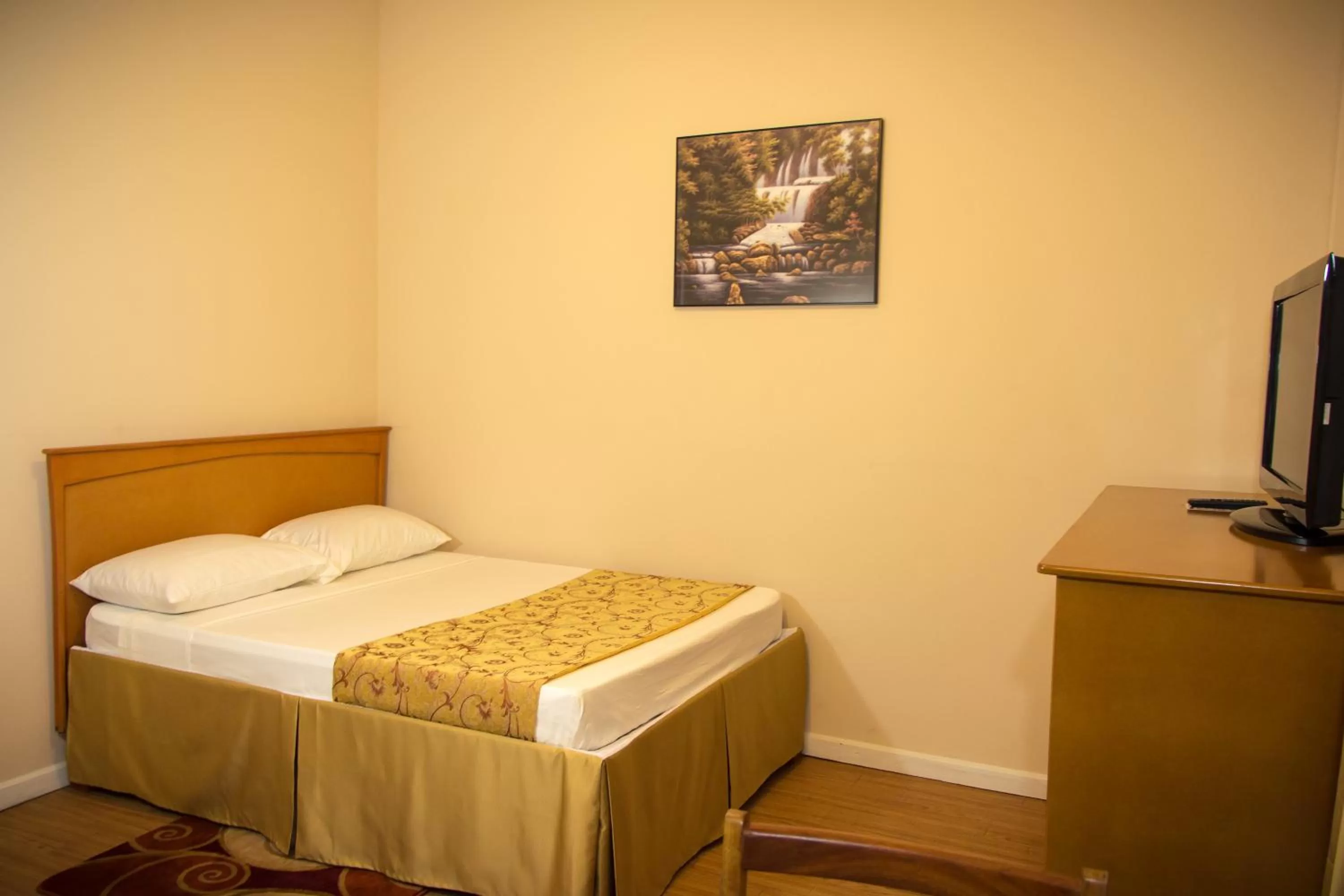 TV and multimedia, Bed in The Durban Hotel Guyana INC.