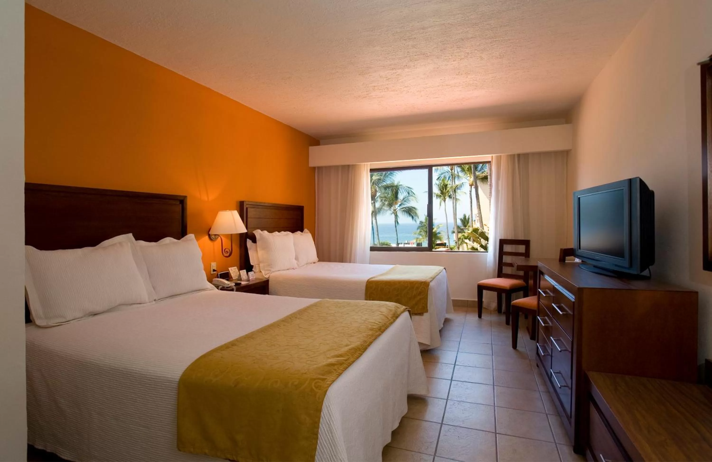 Photo of the whole room, Bed in Canto del Sol Puerto Vallarta All Inclusive