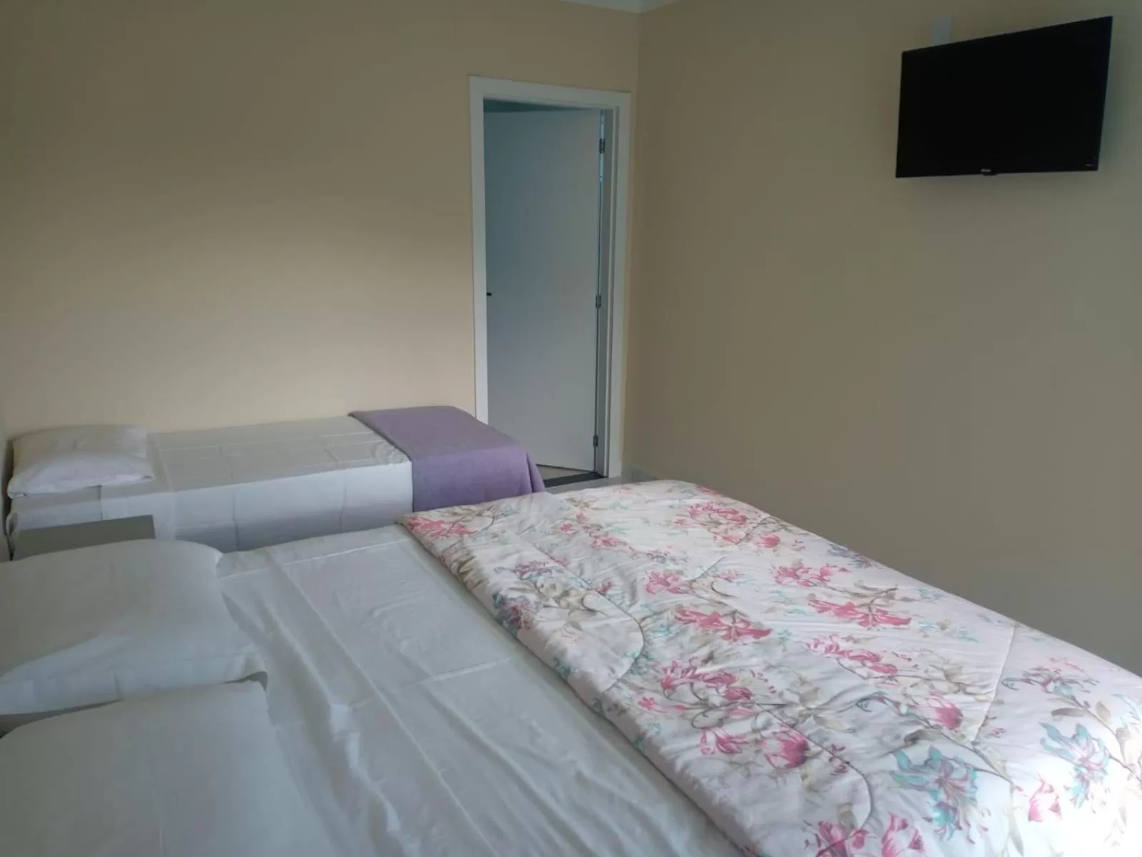 Bed in Pousada Cavalero