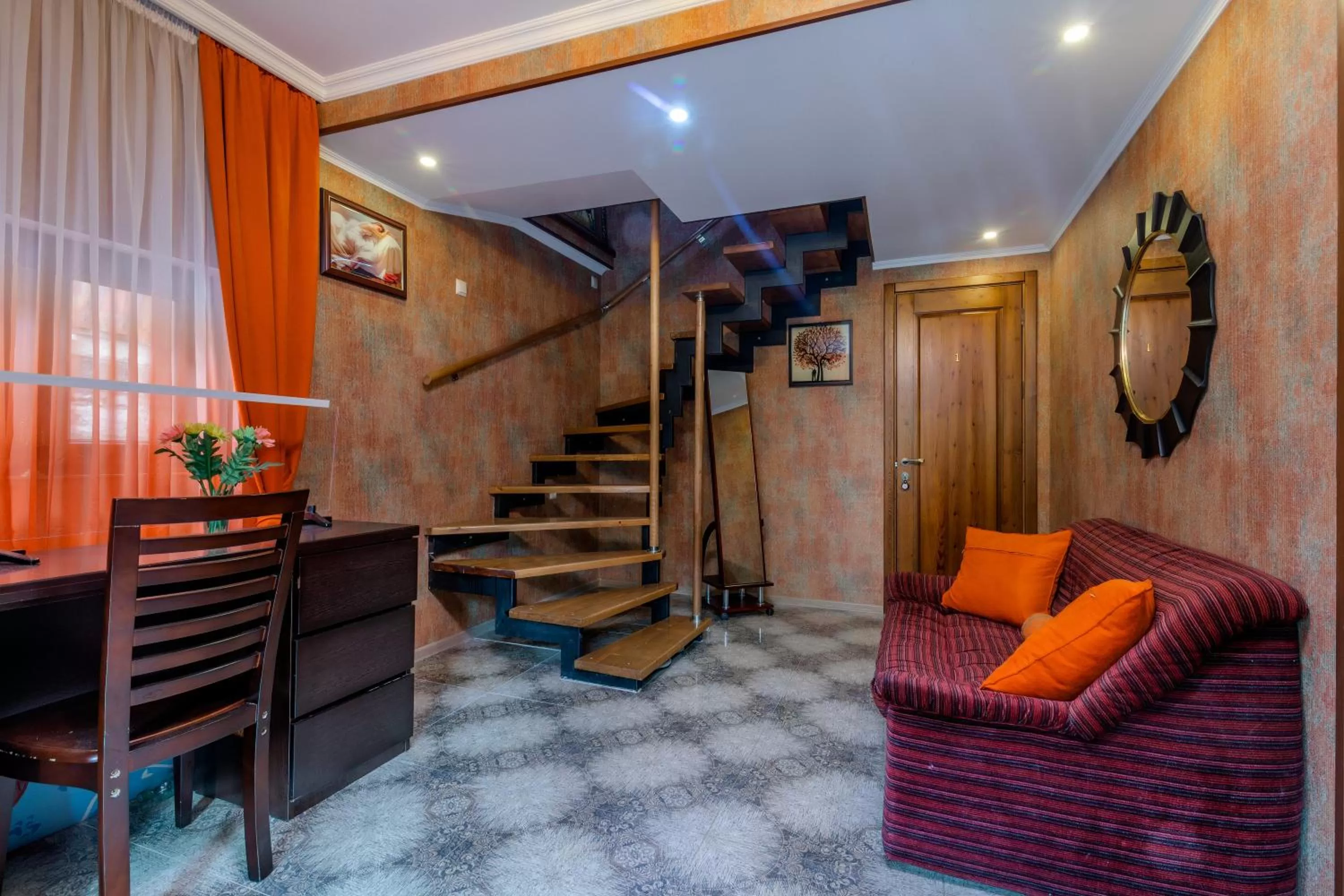 Communal lounge/ TV room in Borjomi Villa Roma