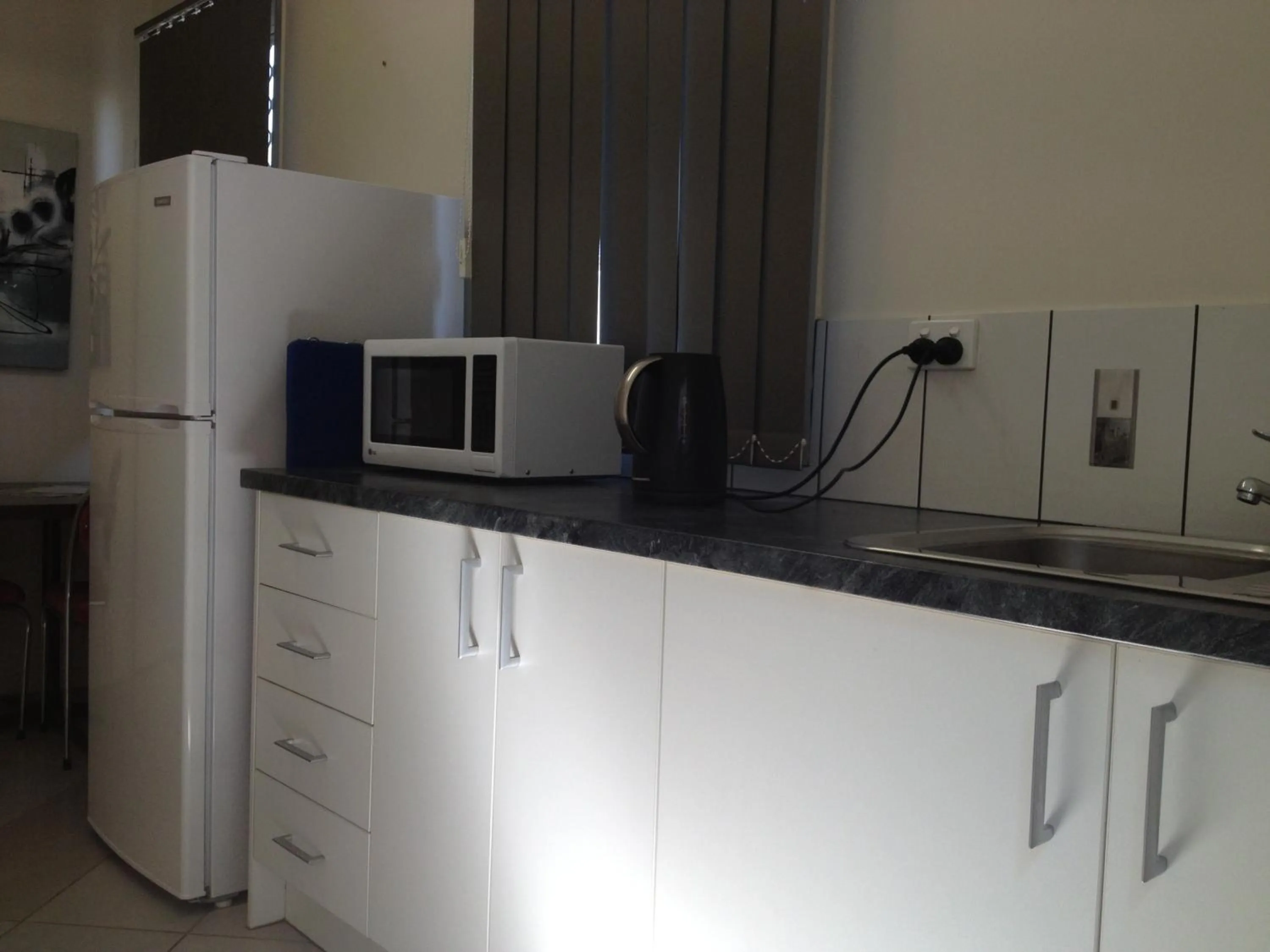 Coffee/tea facilities, Kitchen/Kitchenette in Cityside Accommodation