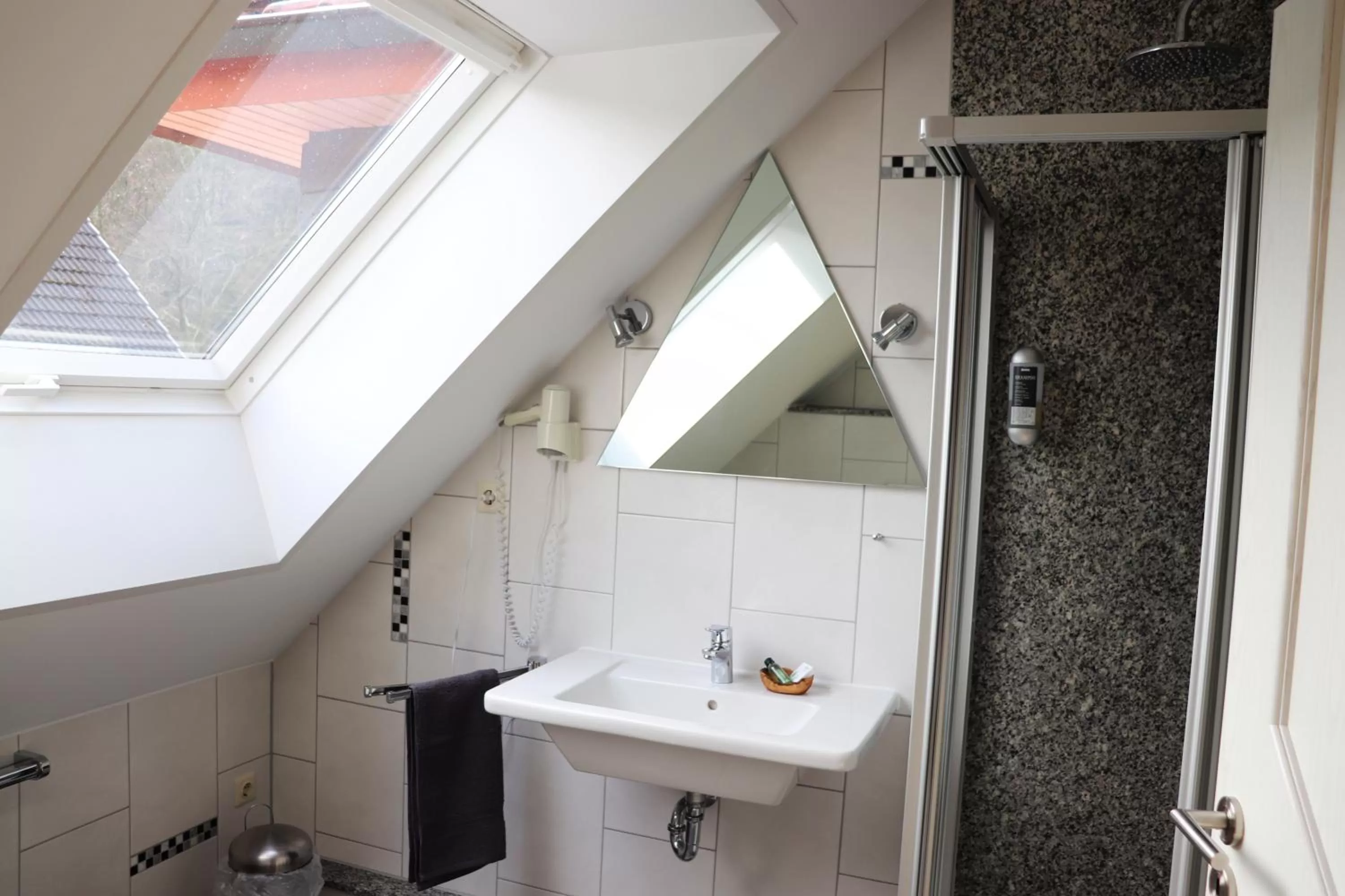 Bathroom in Hotel Rehkitz