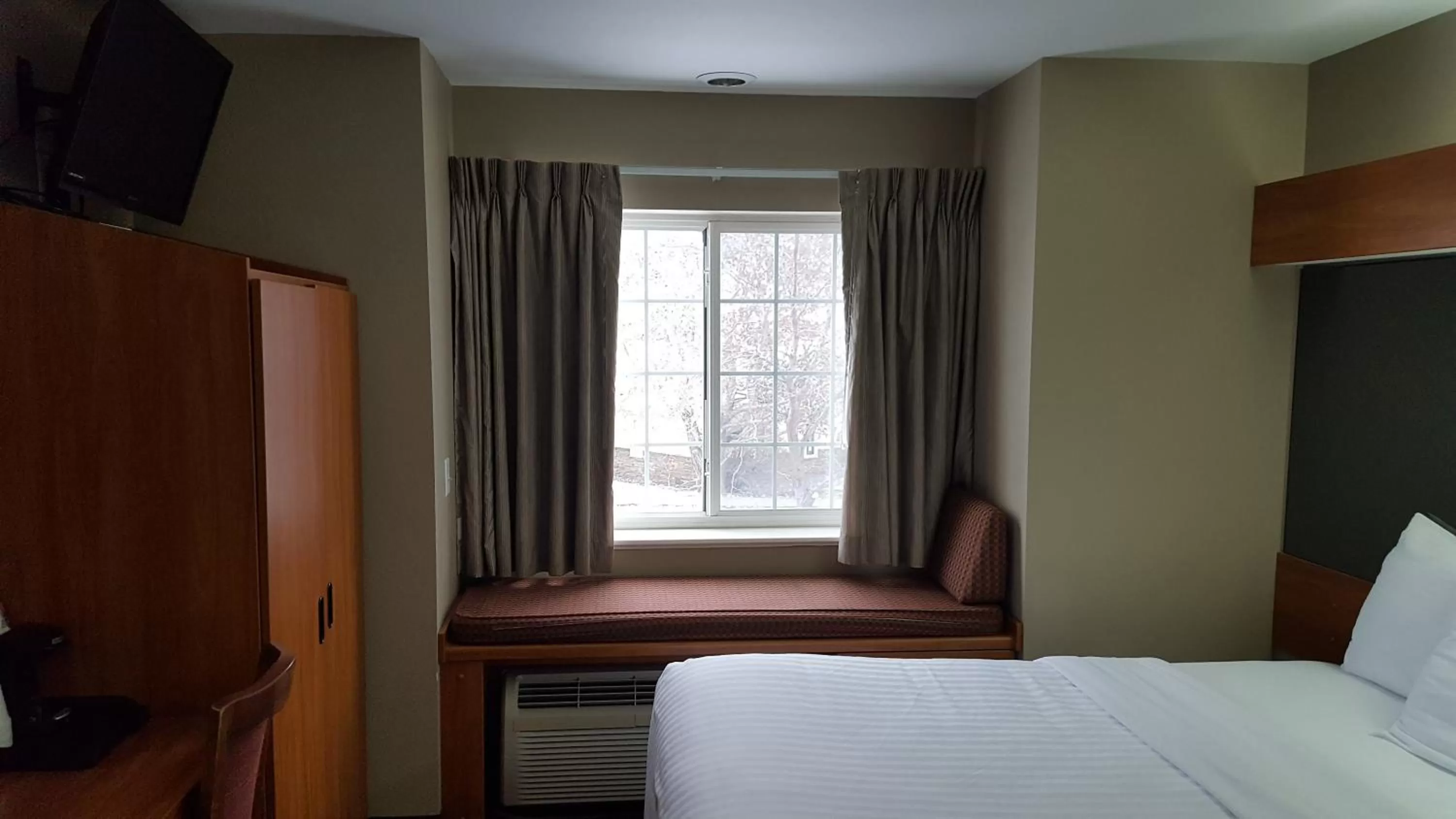 Photo of the whole room, Bed in Microtel Inn & Suites by Wyndham Bozeman