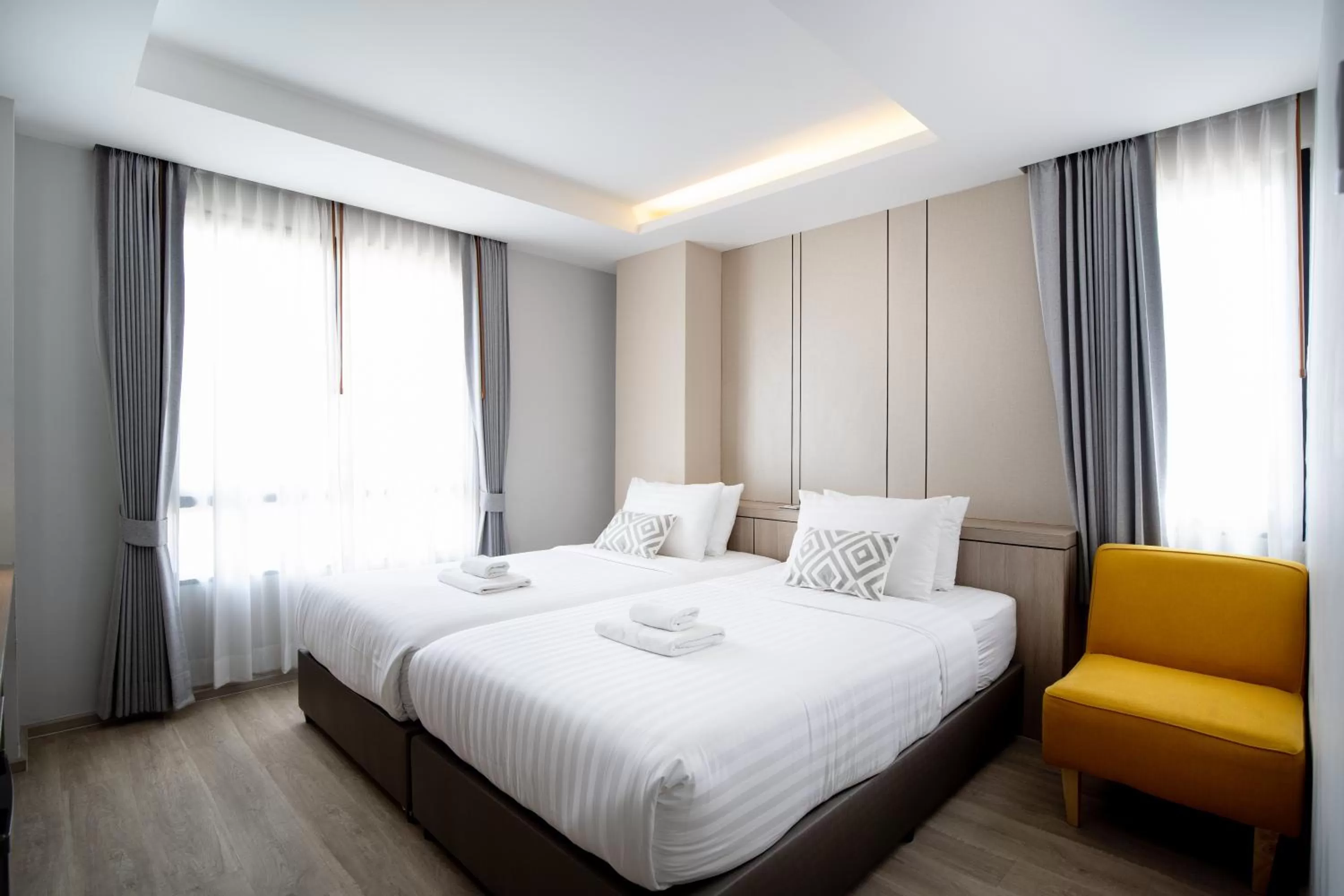 Bed in The Riski Hotel at Bangphlat Station SHA