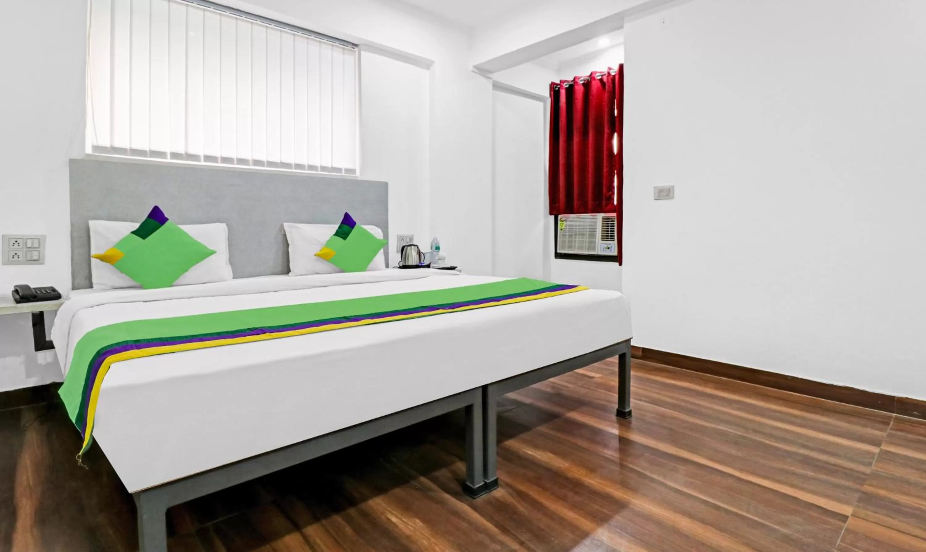 Bedroom, Bed in Treebo Grand Town House