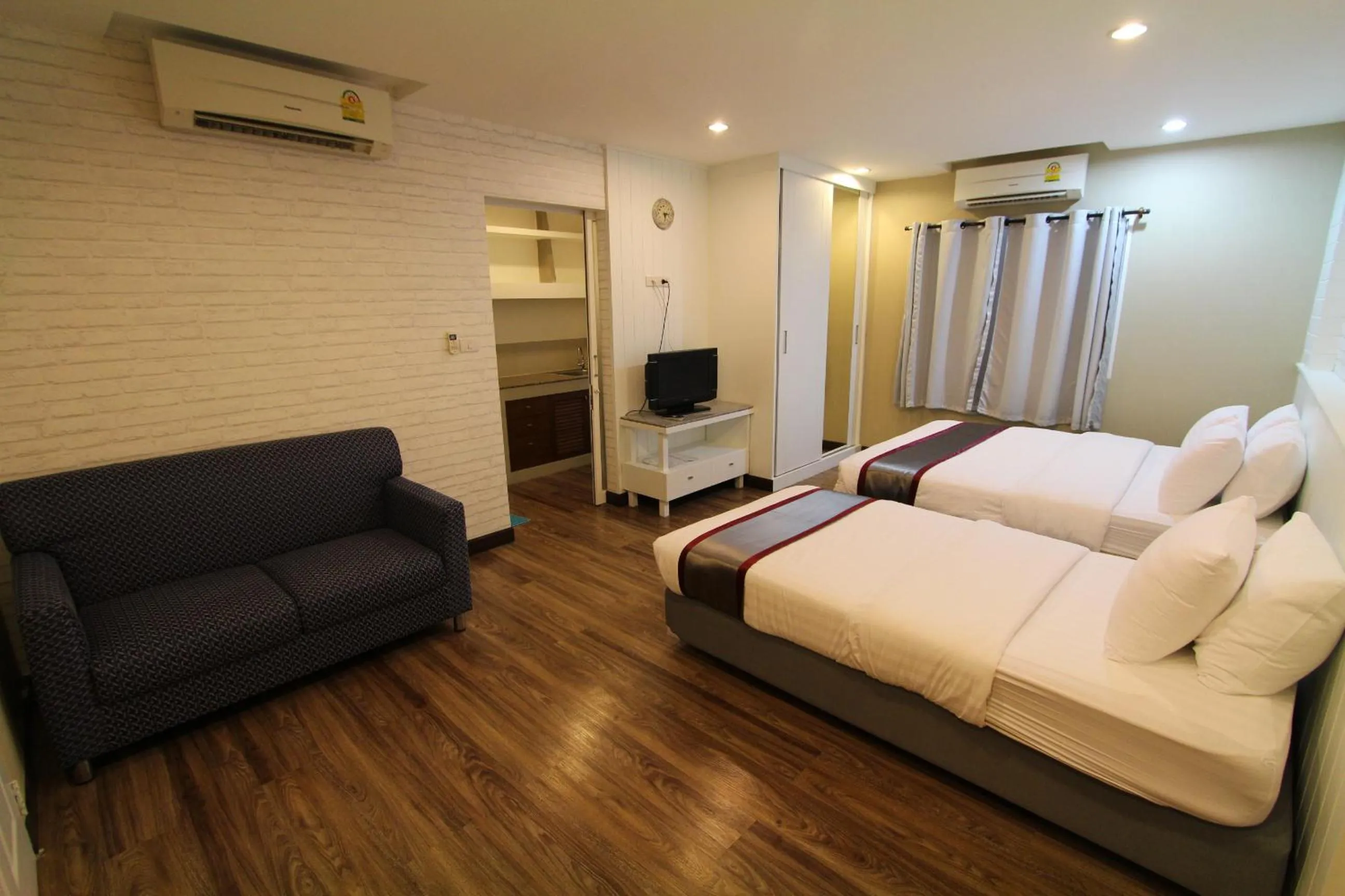 Bed in At Residence Suvarnabhumi Hotel