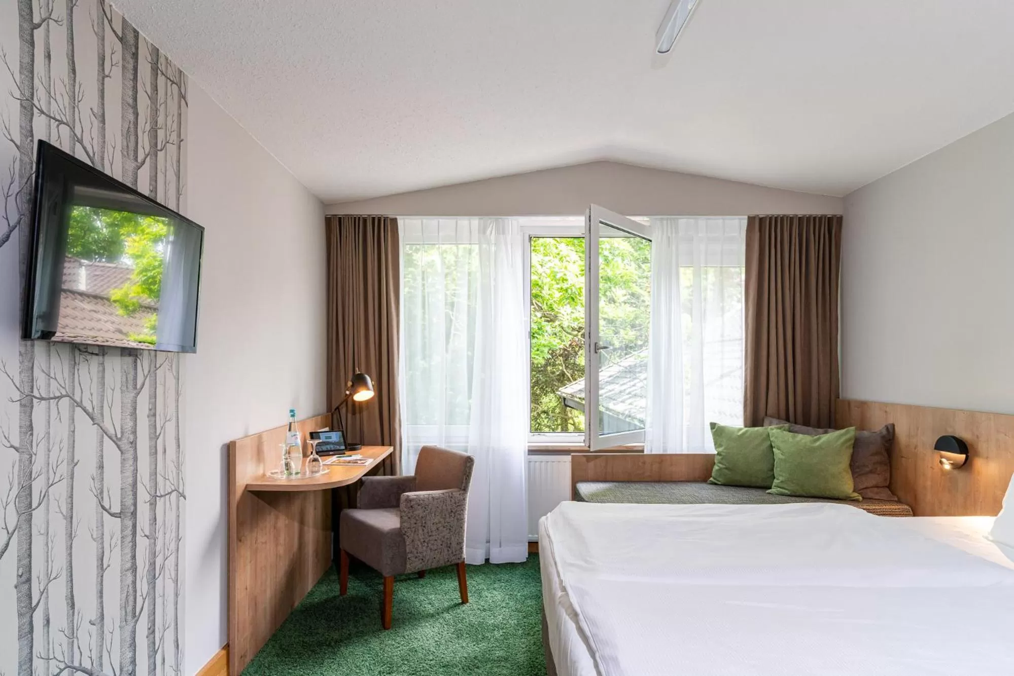 Photo of the whole room, Bed in Waldhotel Tannenhäuschen