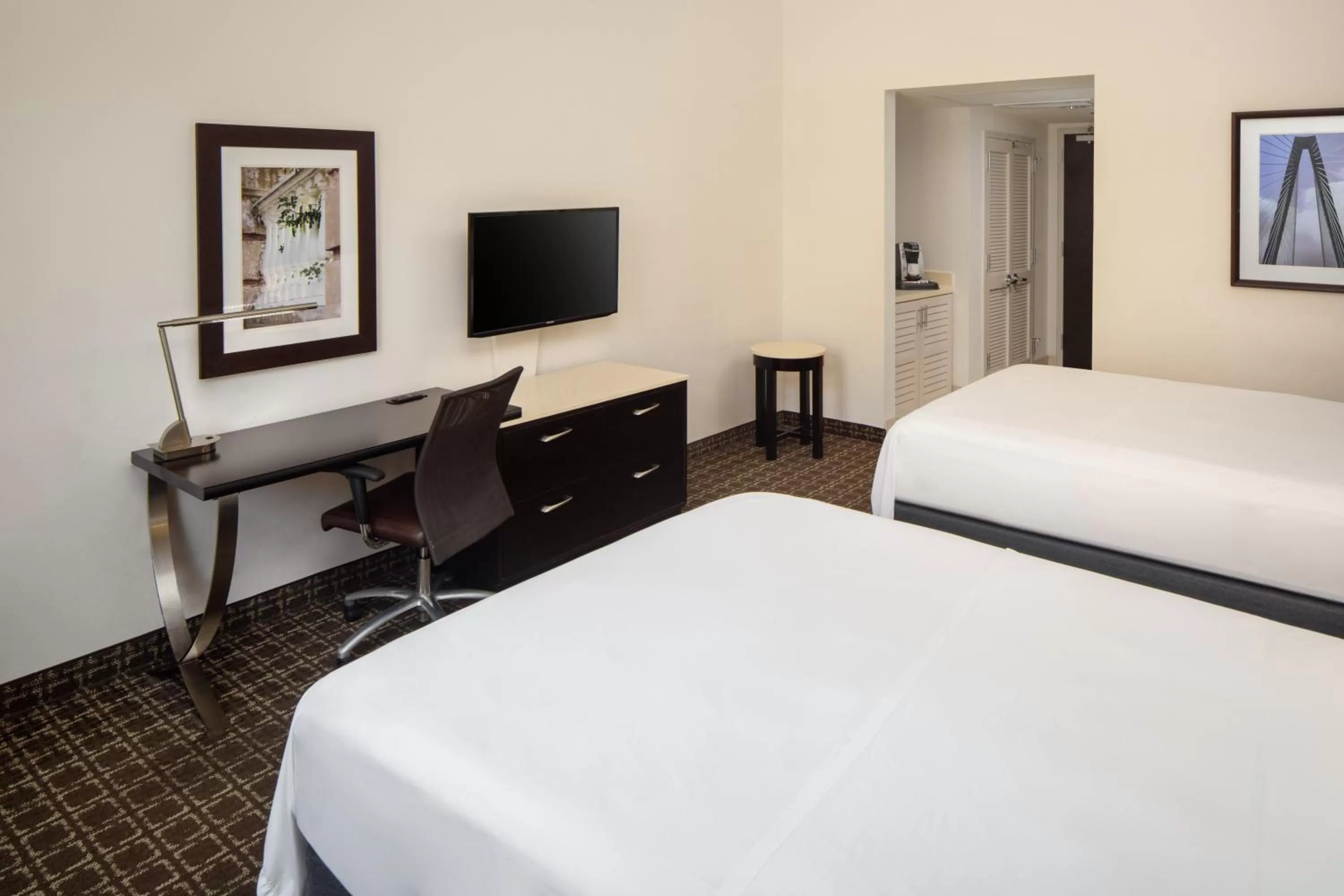 Queen Room with Two Queen Beds and Patio in The Limited Hotel