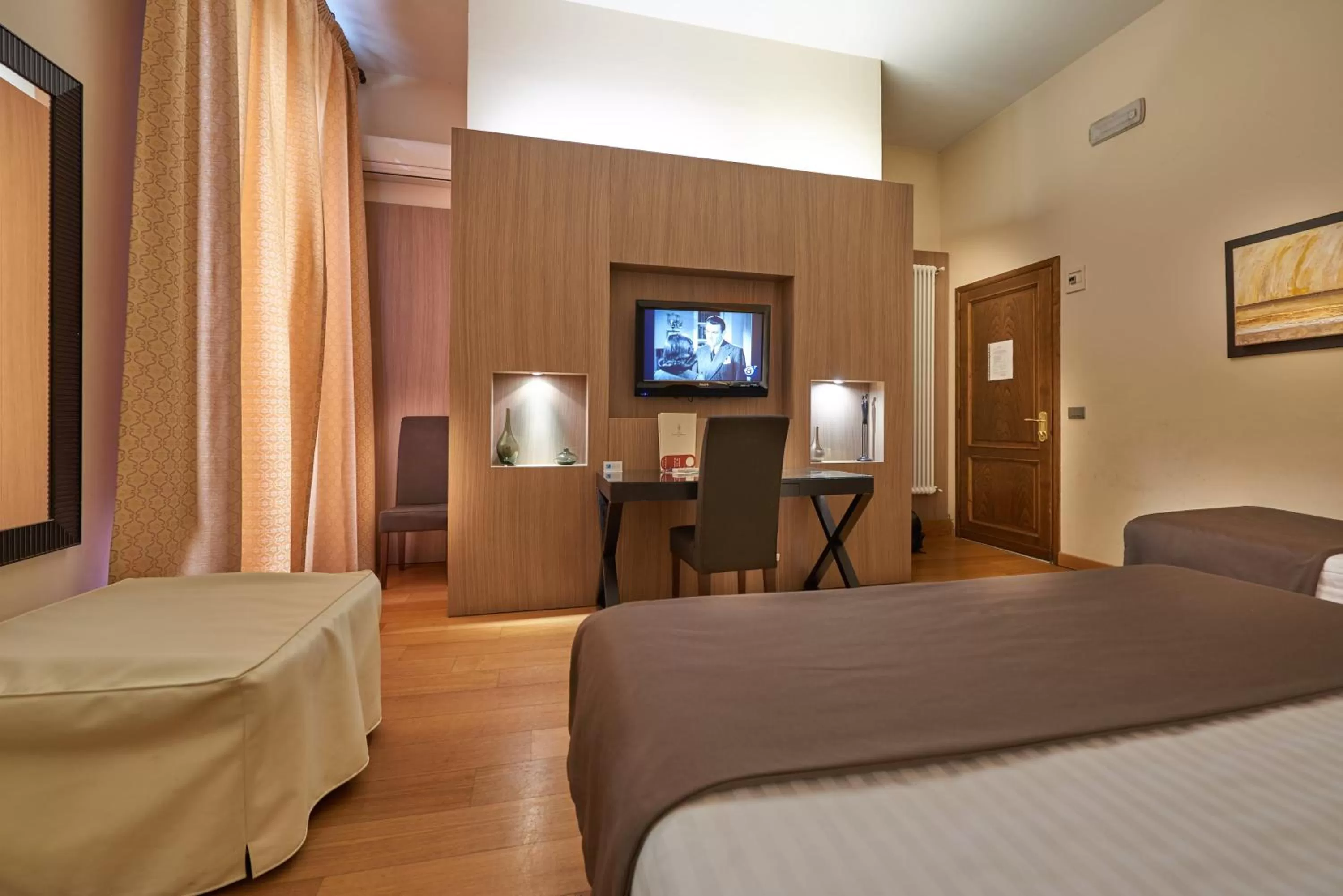 Bed in Hotel Cosimo de' Medici