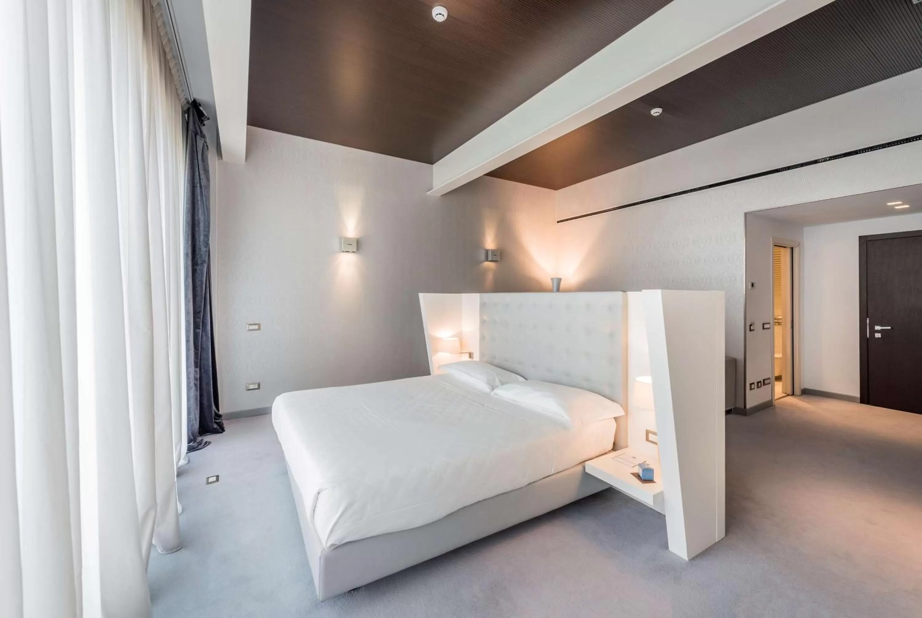 Photo of the whole room, Bed in Devero Hotel & Spa, BW Signature Collection