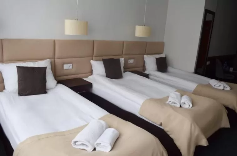 Bed in Hotel Maraton