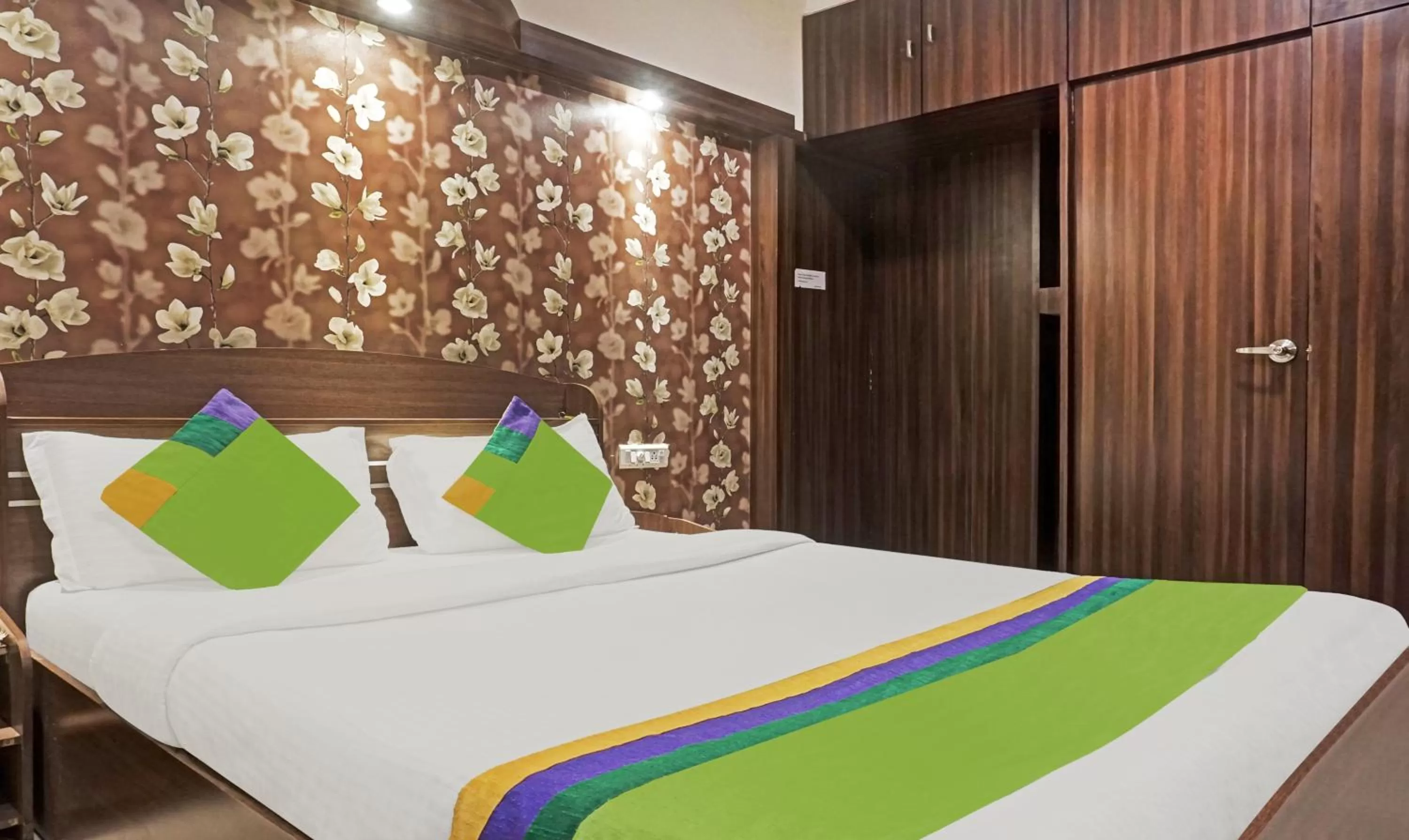 Bedroom, Bed in Treebo Excellent Home