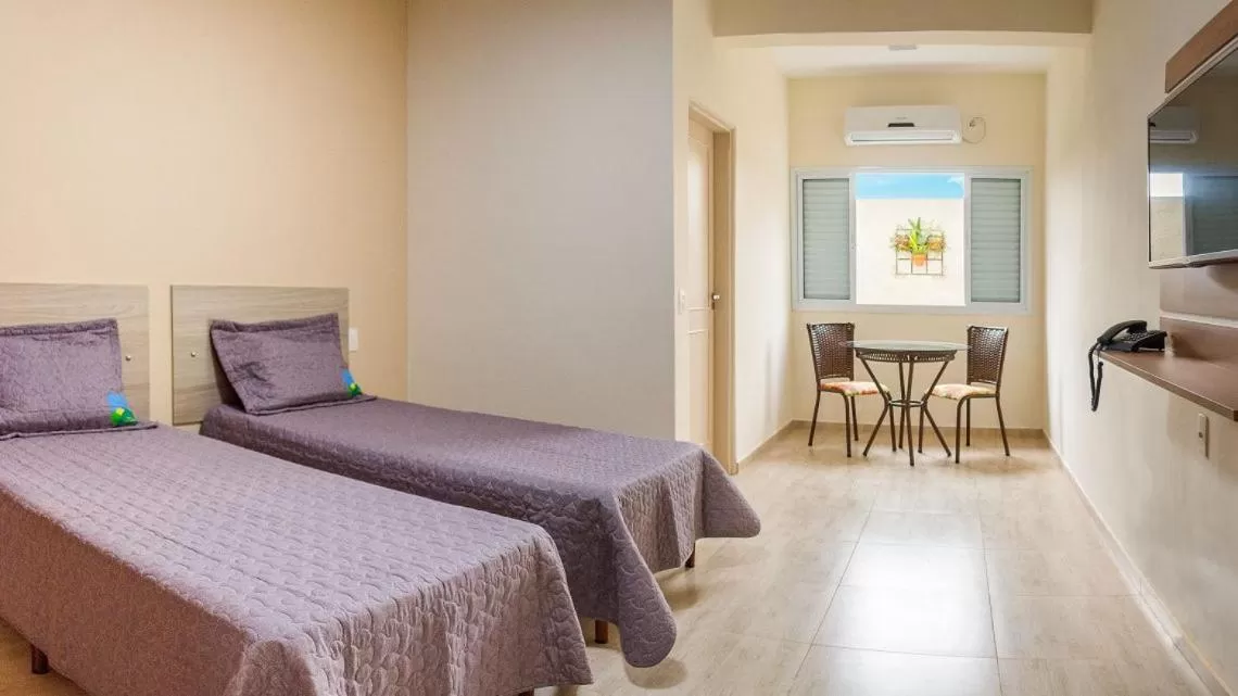 Bed in Pousada Serra Nascente do Sol