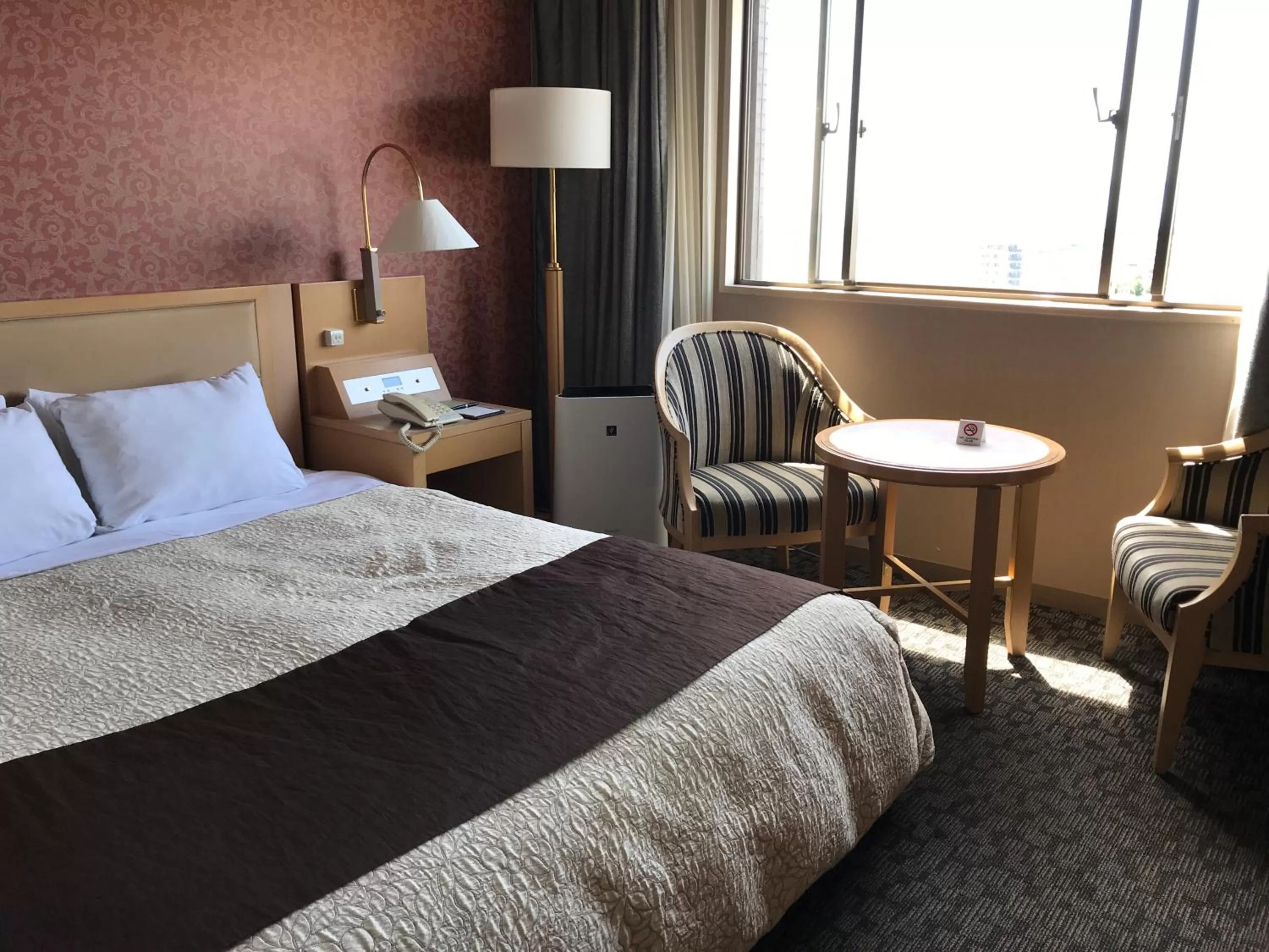 Bed in Numazu River Side Hotel