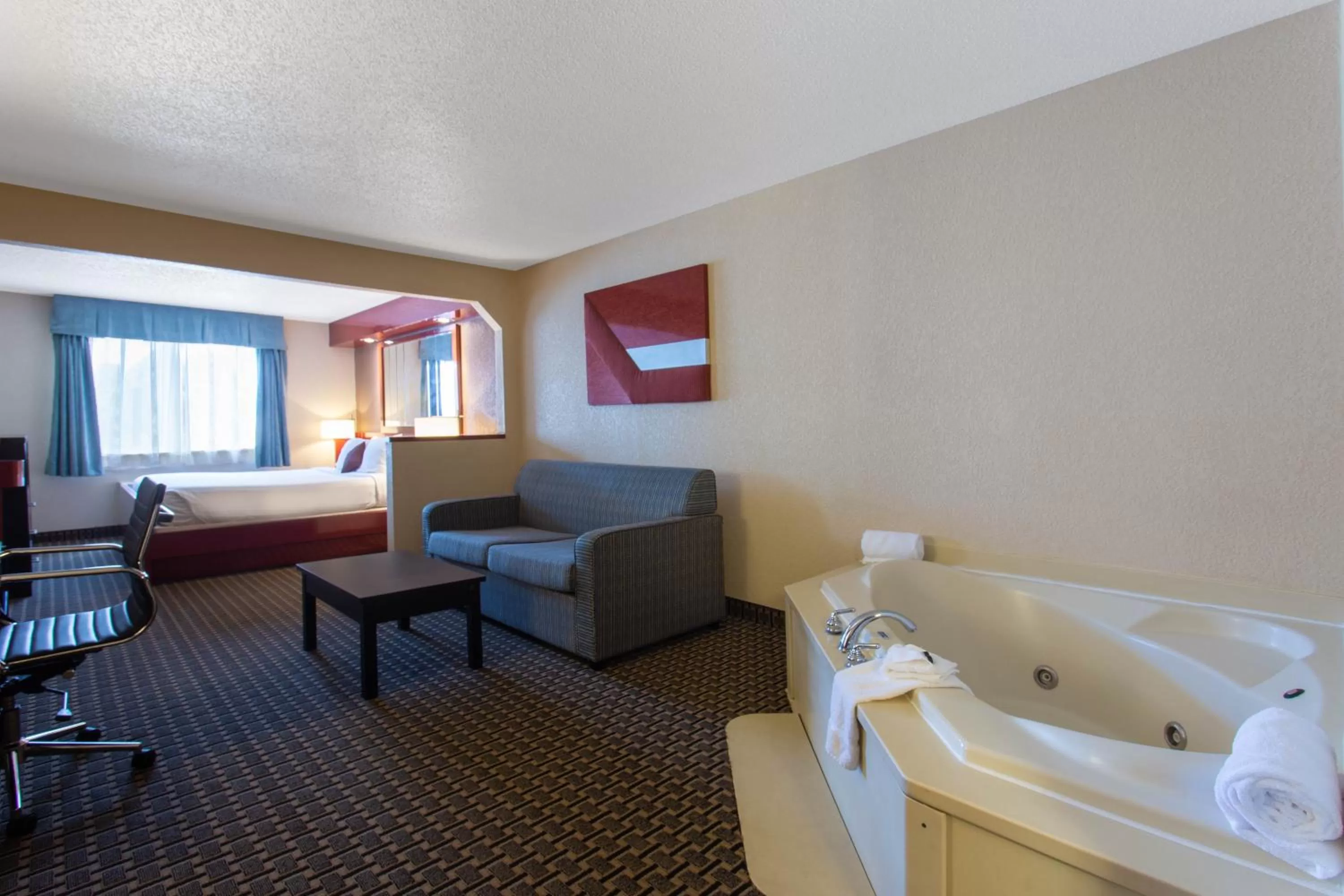 Bed in Ramada by Wyndham Glendale Heights/Lombard