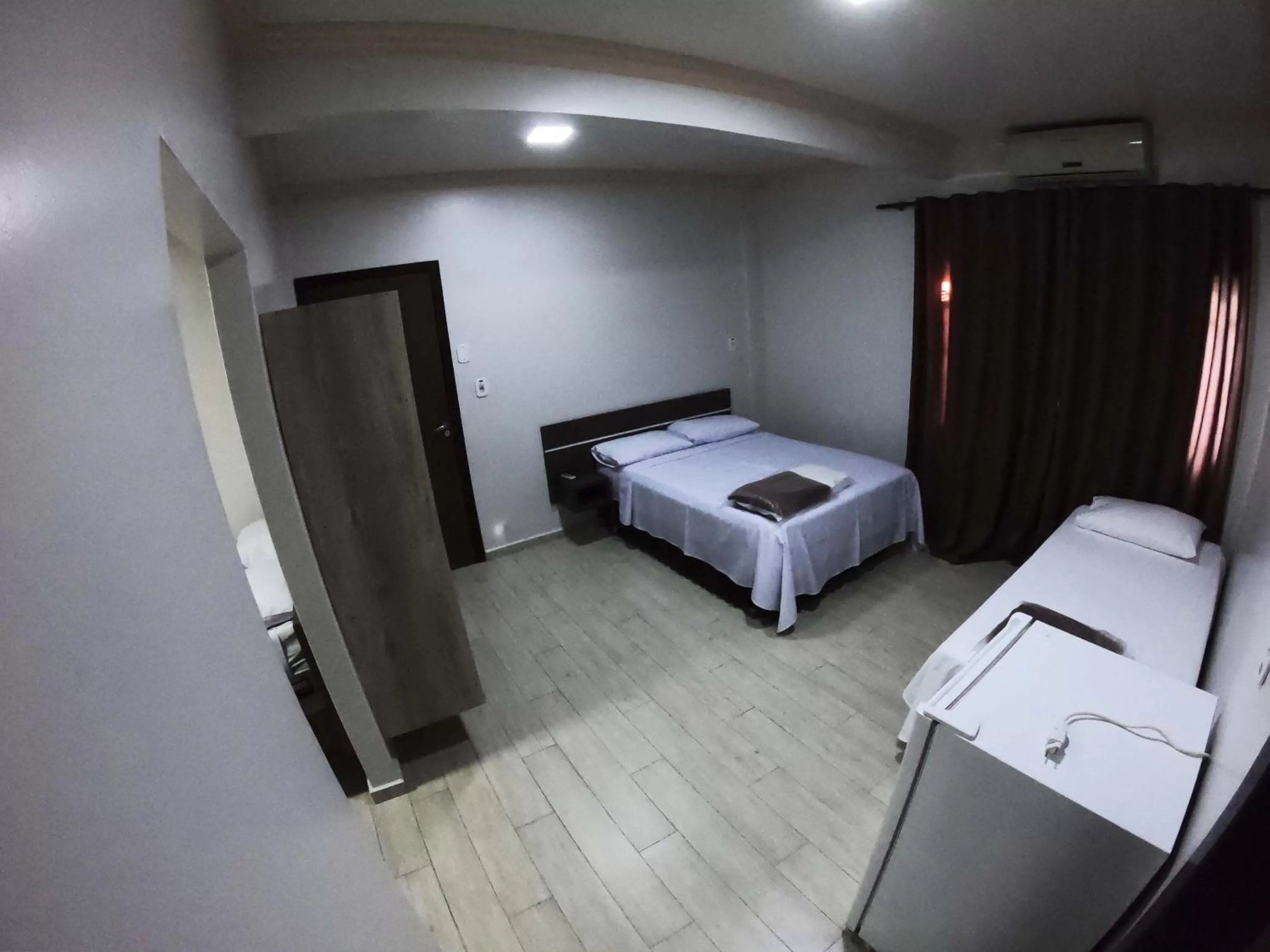 Bed in Hotel Paradizzo