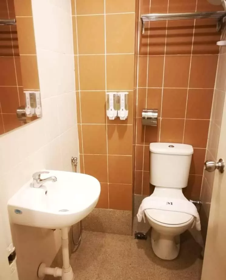 Toilet, Bathroom in Merilton Hotel